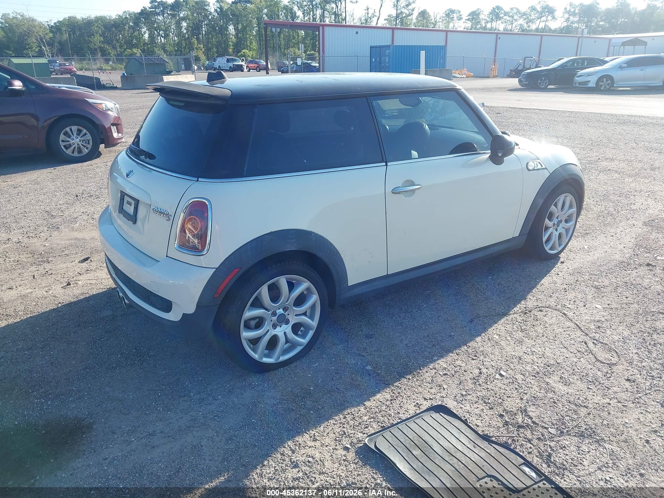 2010 Mini Cooper S   Cream vin: WMWMF7C59ATZ70250