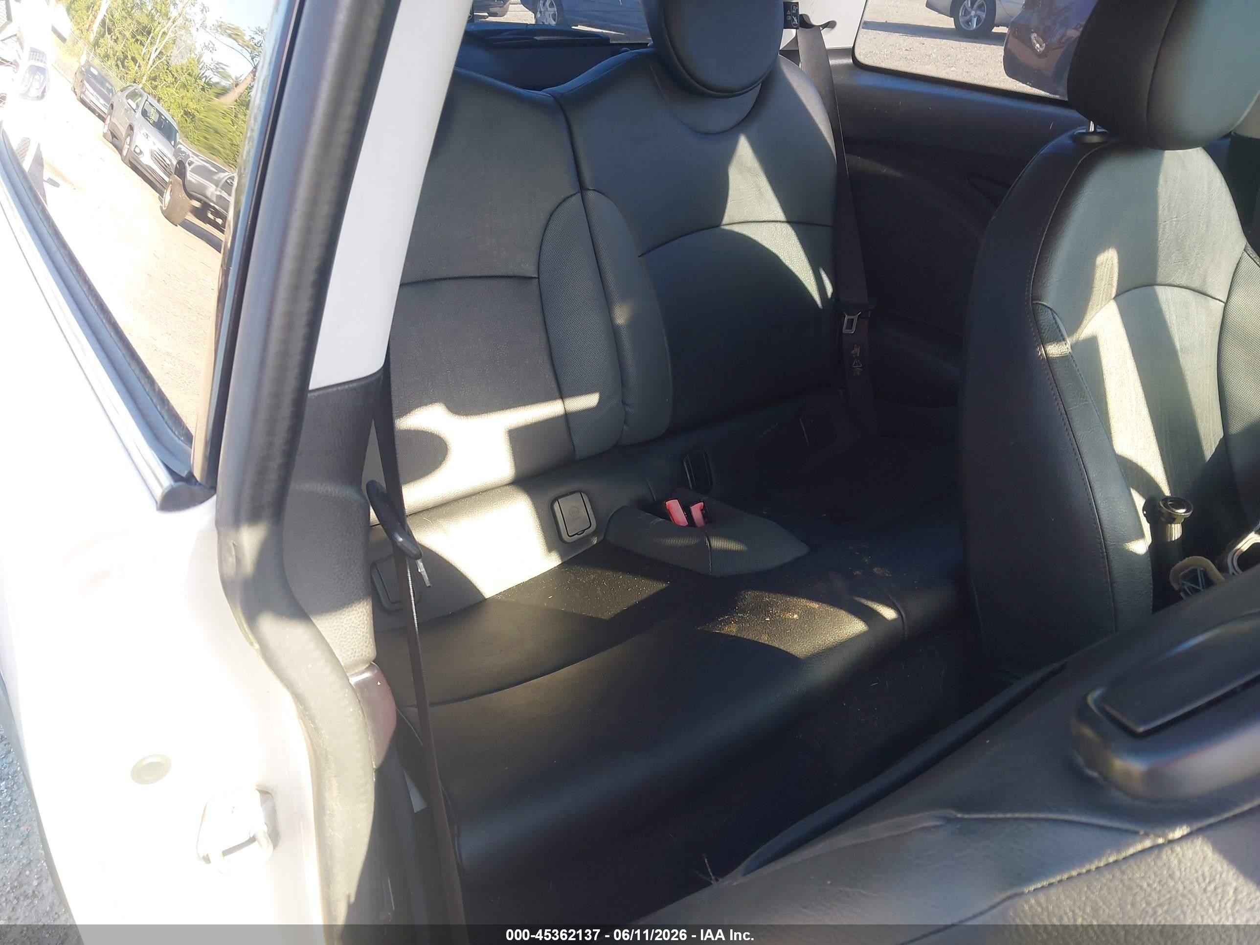 2010 Mini Cooper S   Cream vin: WMWMF7C59ATZ70250
