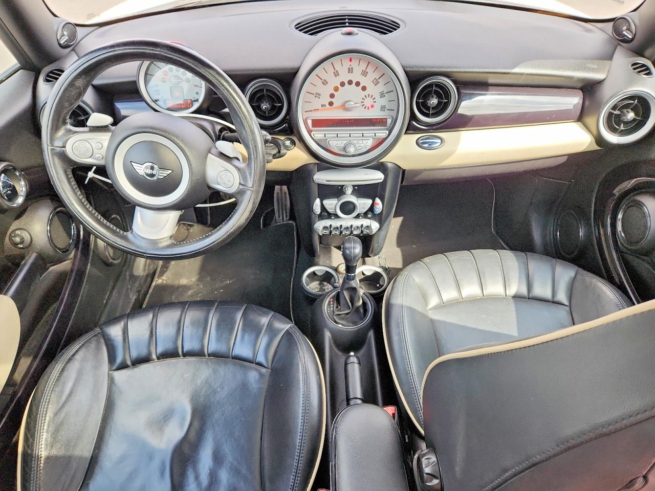 2010 Mini Cooper S Cream vin: WMWMF7C59ATZ70958