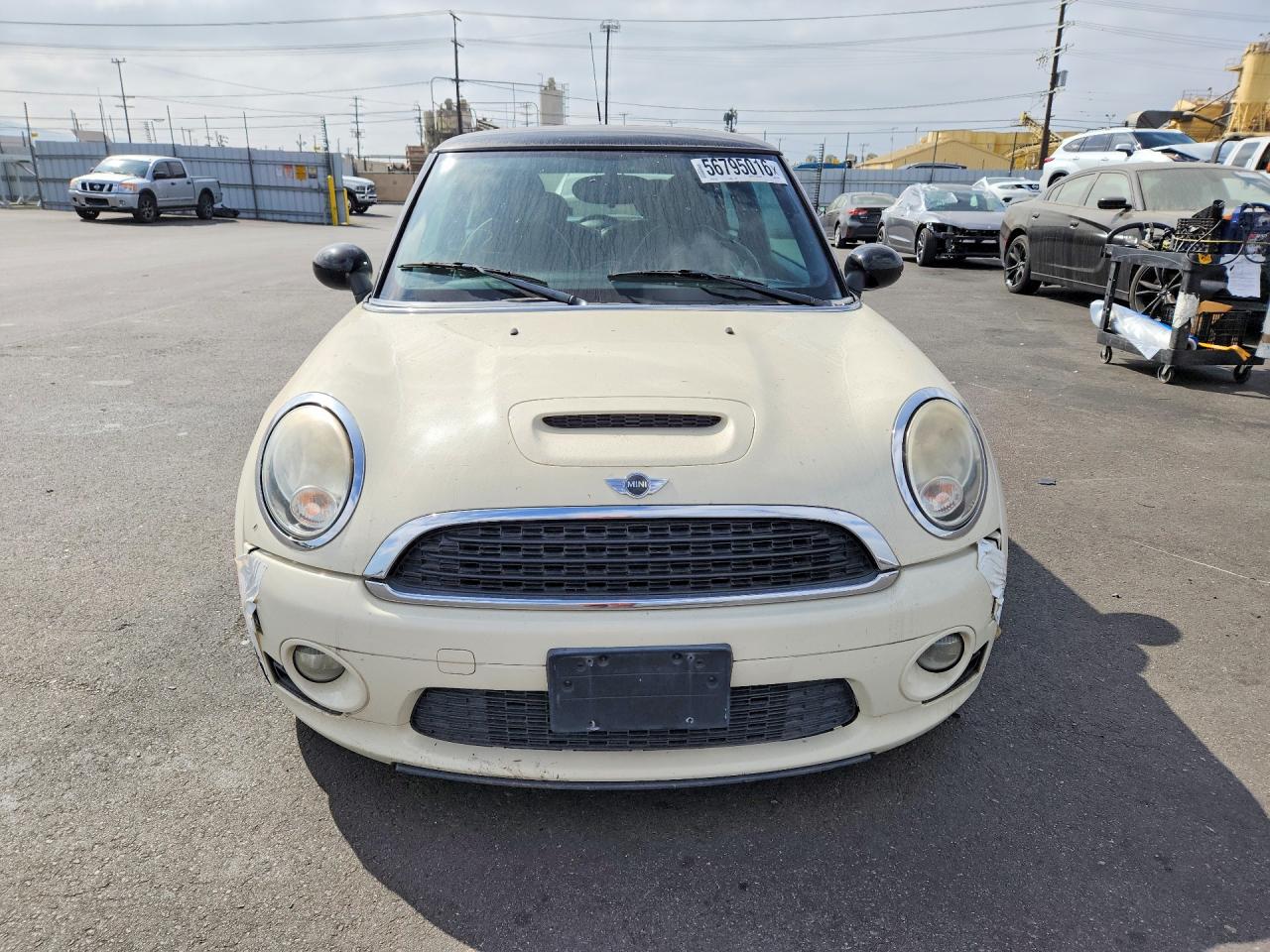 2010 Mini Cooper S Cream vin: WMWMF7C59ATZ70958