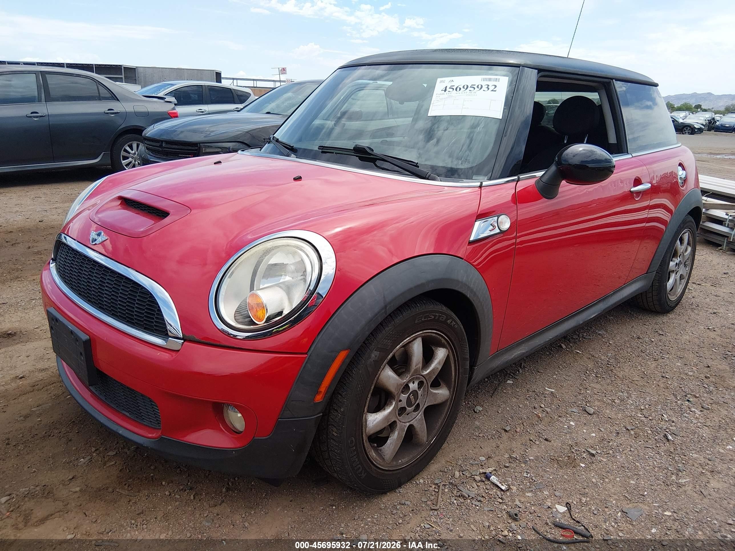 2010 Mini Cooper S   Red vin: WMWMF7C59ATZ71110