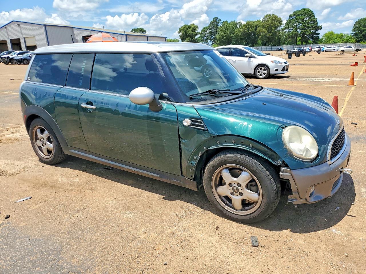 2009 Mini Cooper Clubman Green vin: WMWML33559TX34532