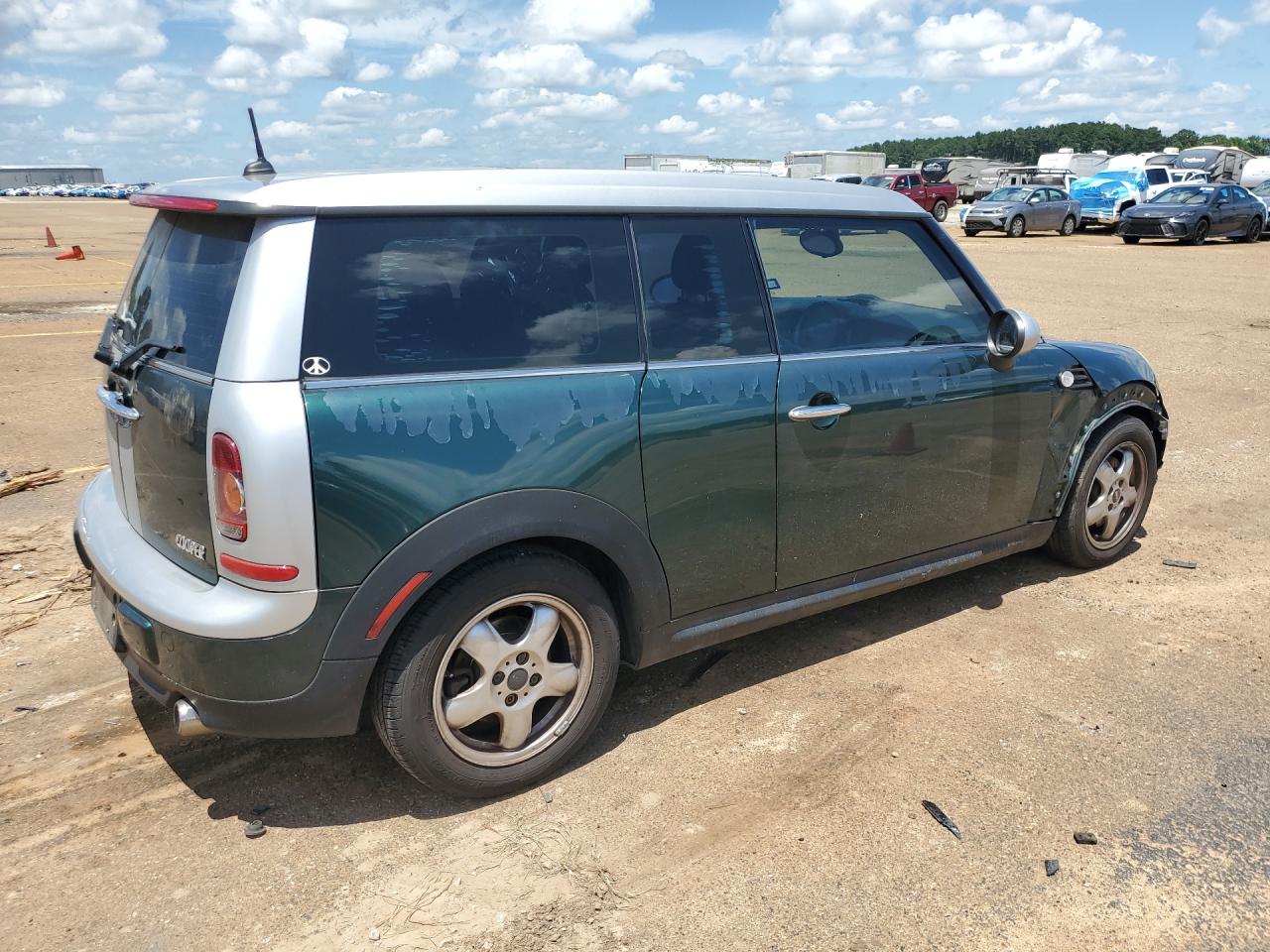 2009 Mini Cooper Clubman Green vin: WMWML33559TX34532