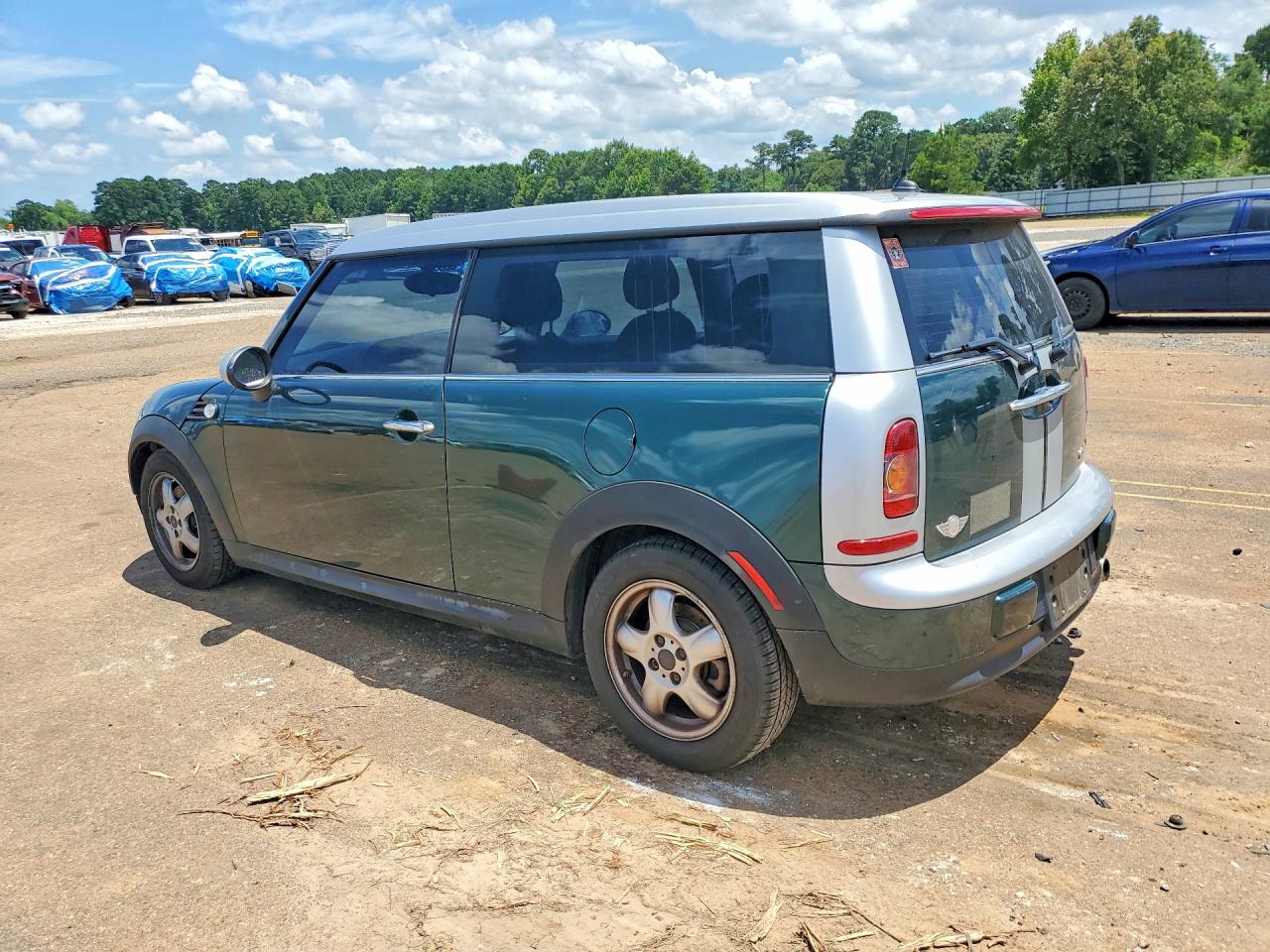 2009 Mini Cooper Clubman Green vin: WMWML33559TX34532