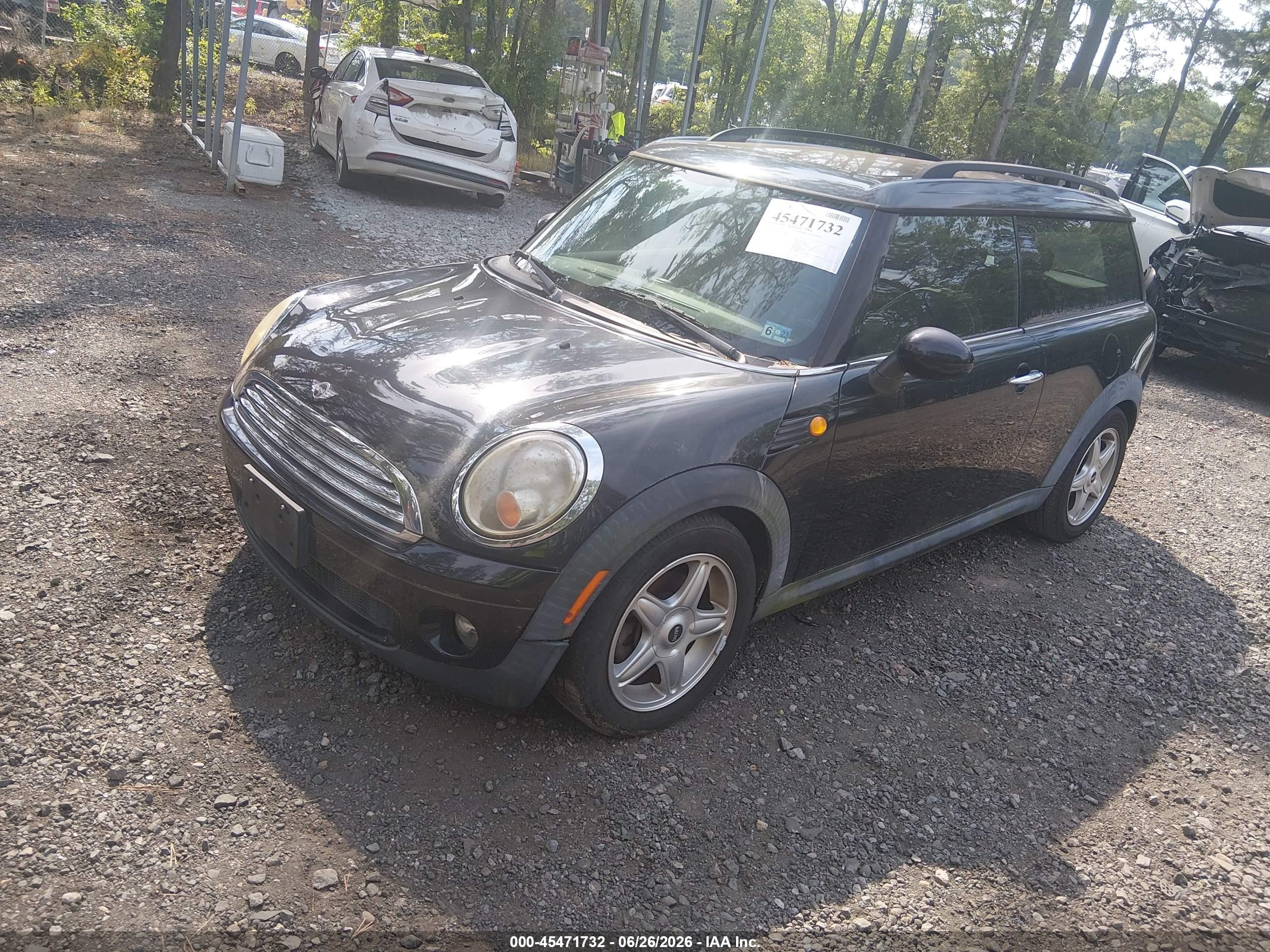 2009 Mini Cooper Clubman   Черный vin: WMWML33599TX35408