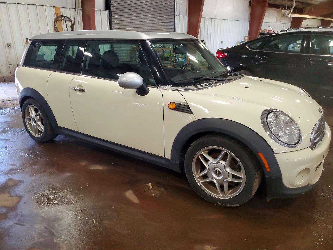 2010 Mini Cooper Clubman Cream vin: WMWML3C53ATX36798