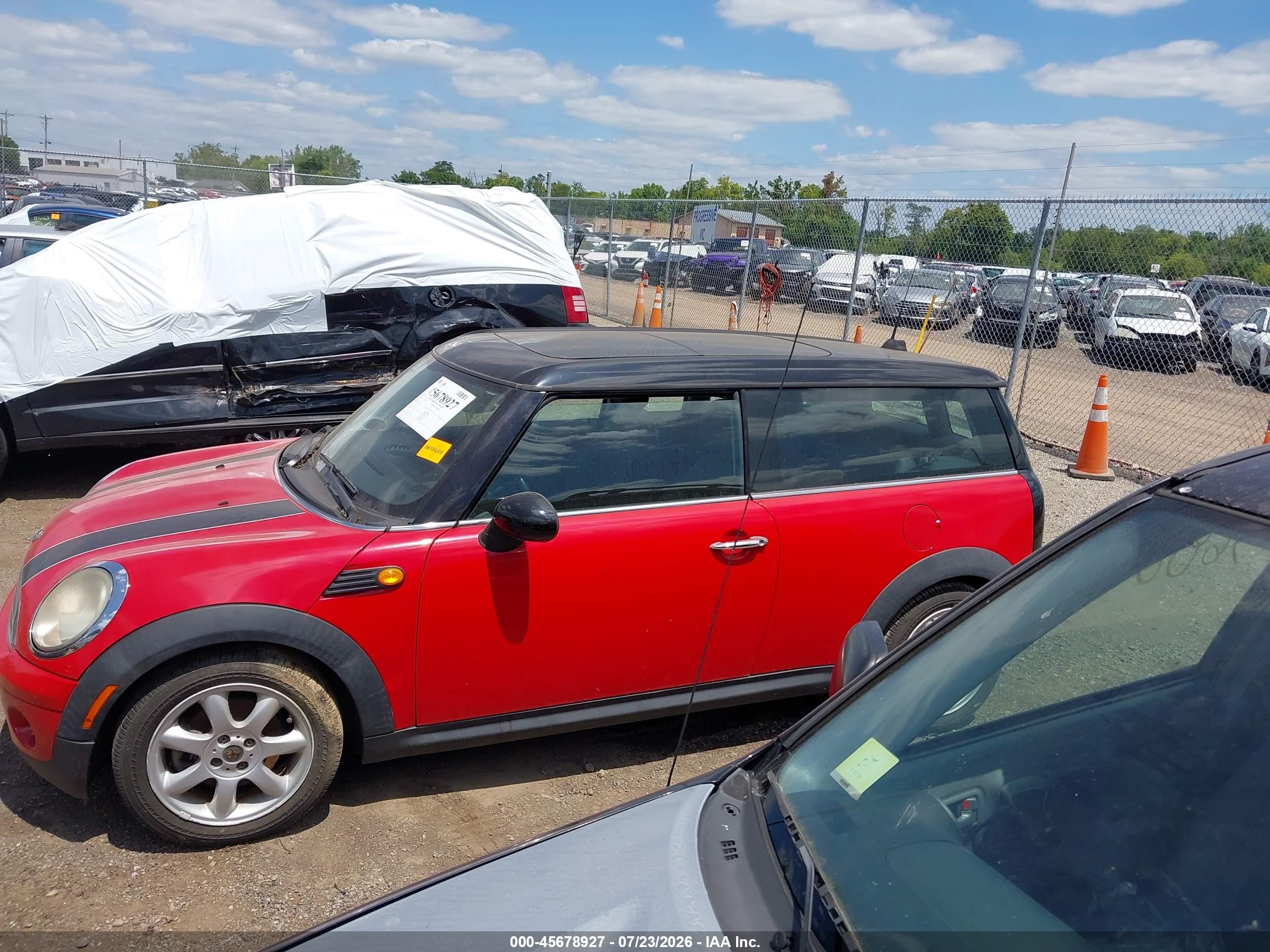 2010 Mini Cooper Clubman   Red vin: WMWML3C56ATX51649