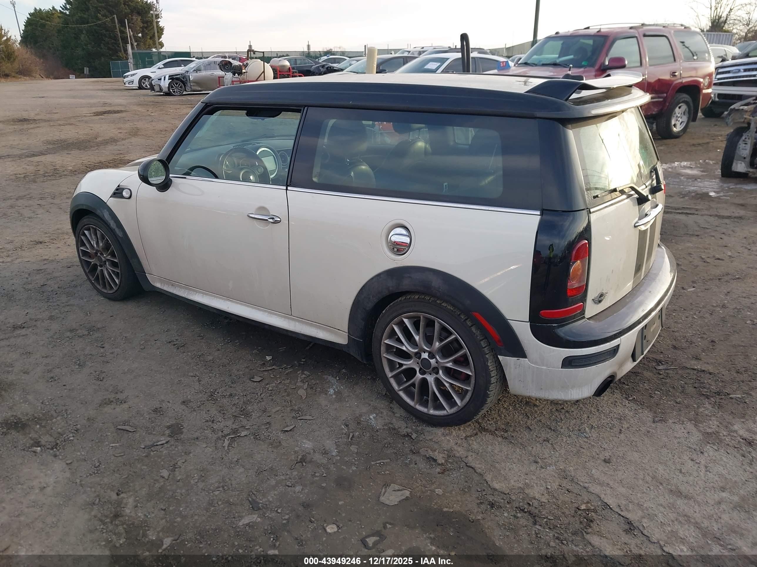 2009 Mini John Cooper Works   White vin: WMWMM93529TL04117