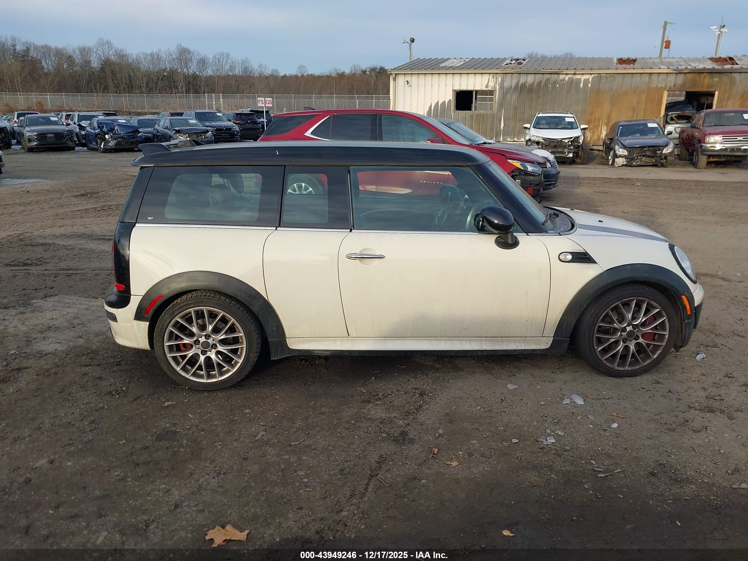 2009 Mini John Cooper Works   White vin: WMWMM93529TL04117