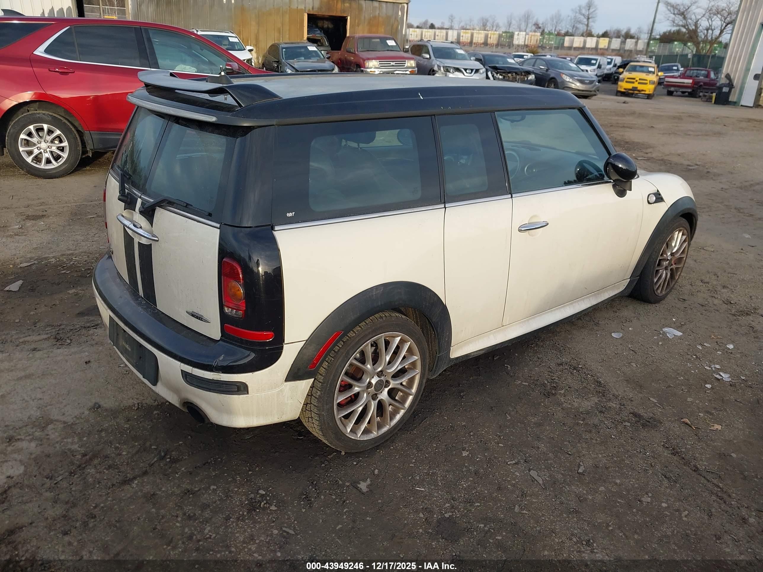 2009 Mini John Cooper Works   White vin: WMWMM93529TL04117