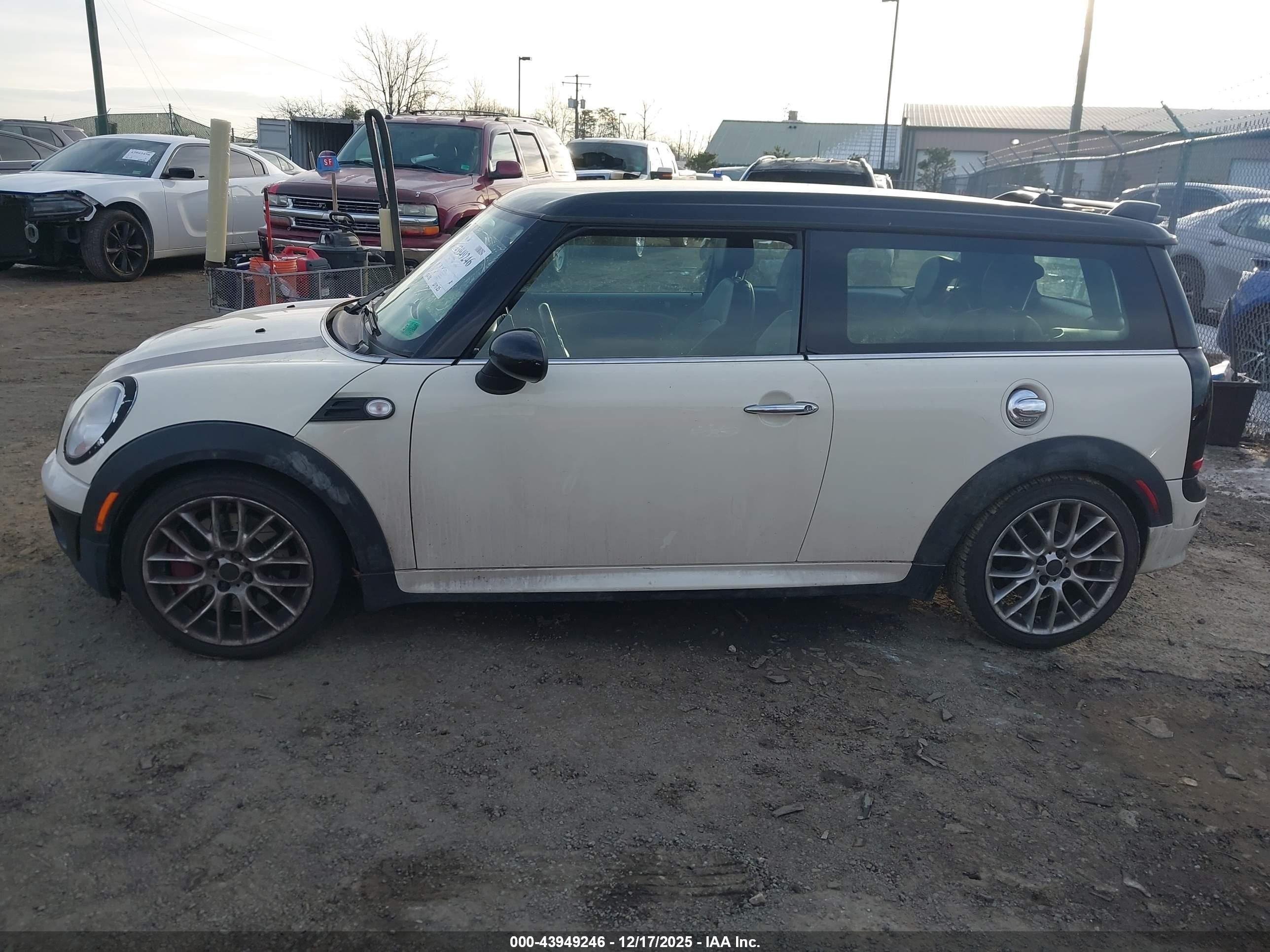 2009 Mini John Cooper Works   White vin: WMWMM93529TL04117