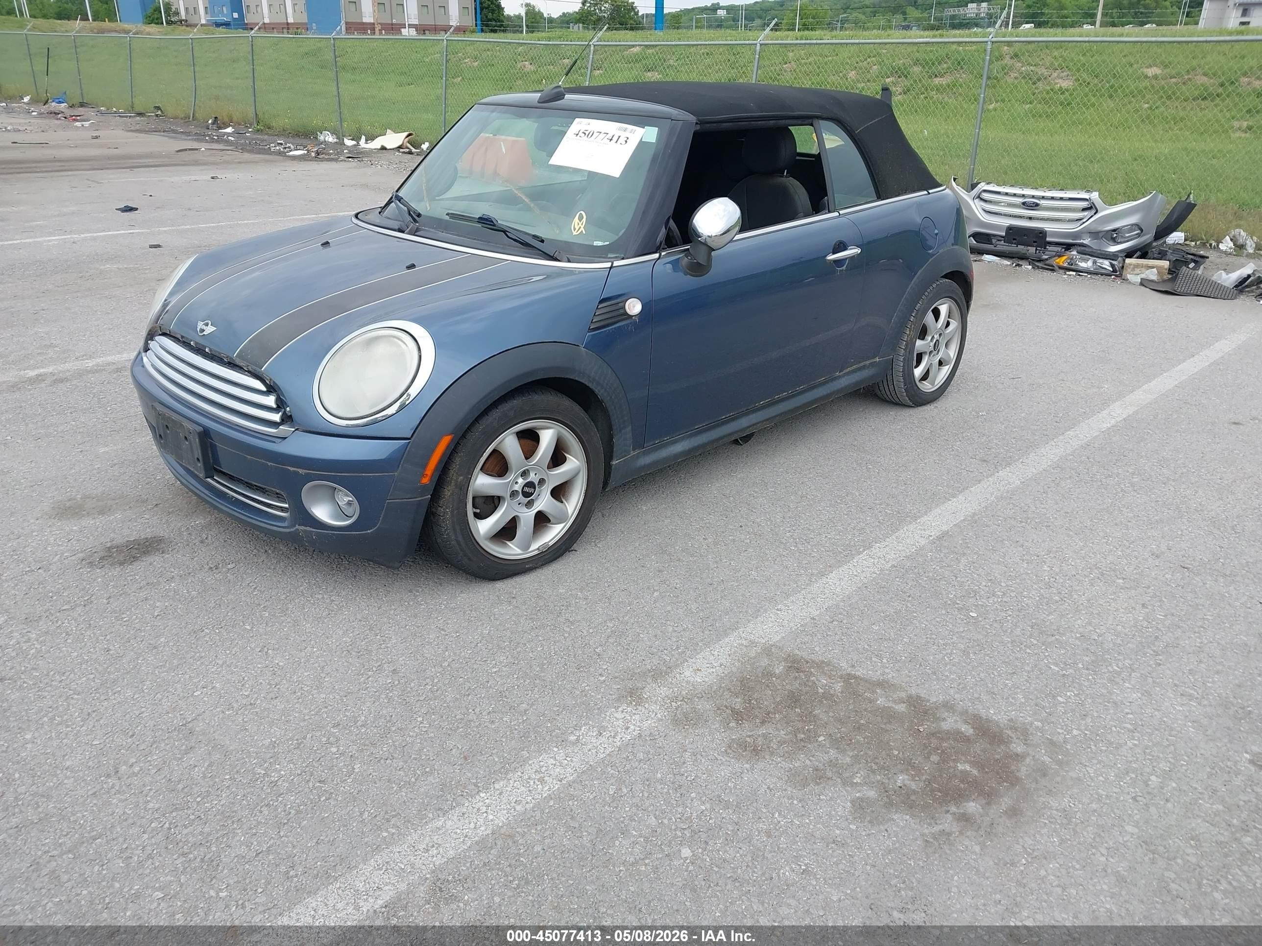 2009 Mini Cooper   Синий vin: WMWMR33529TU96041