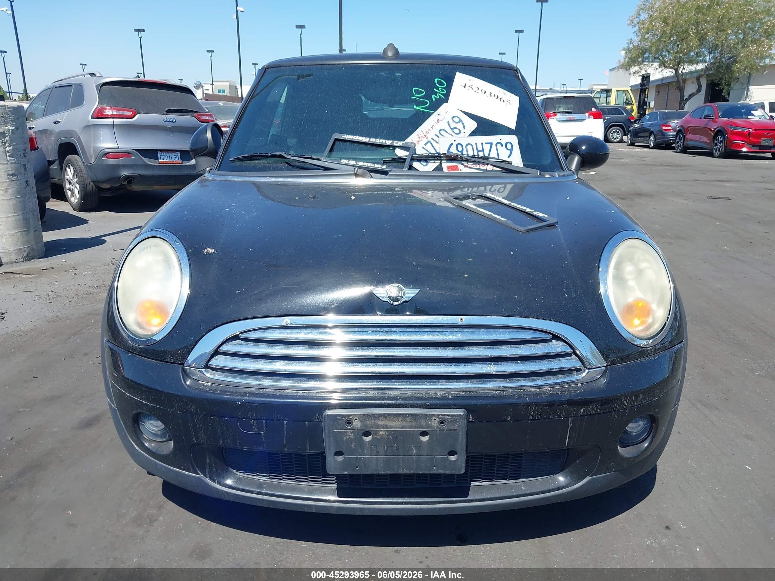 2009 Mini Cooper   Black vin: WMWMR33549TU95506