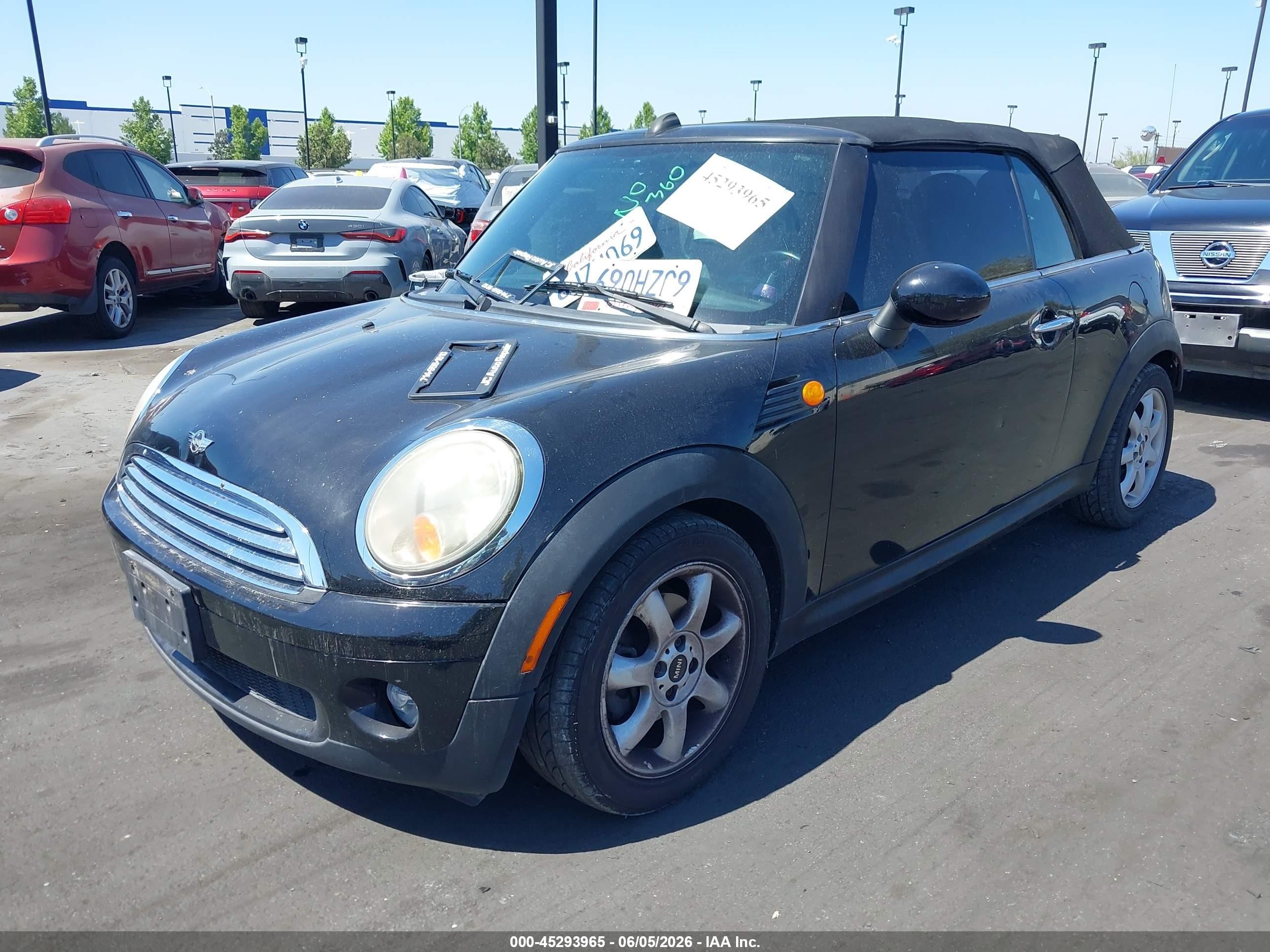 2009 Mini Cooper   Black vin: WMWMR33549TU95506
