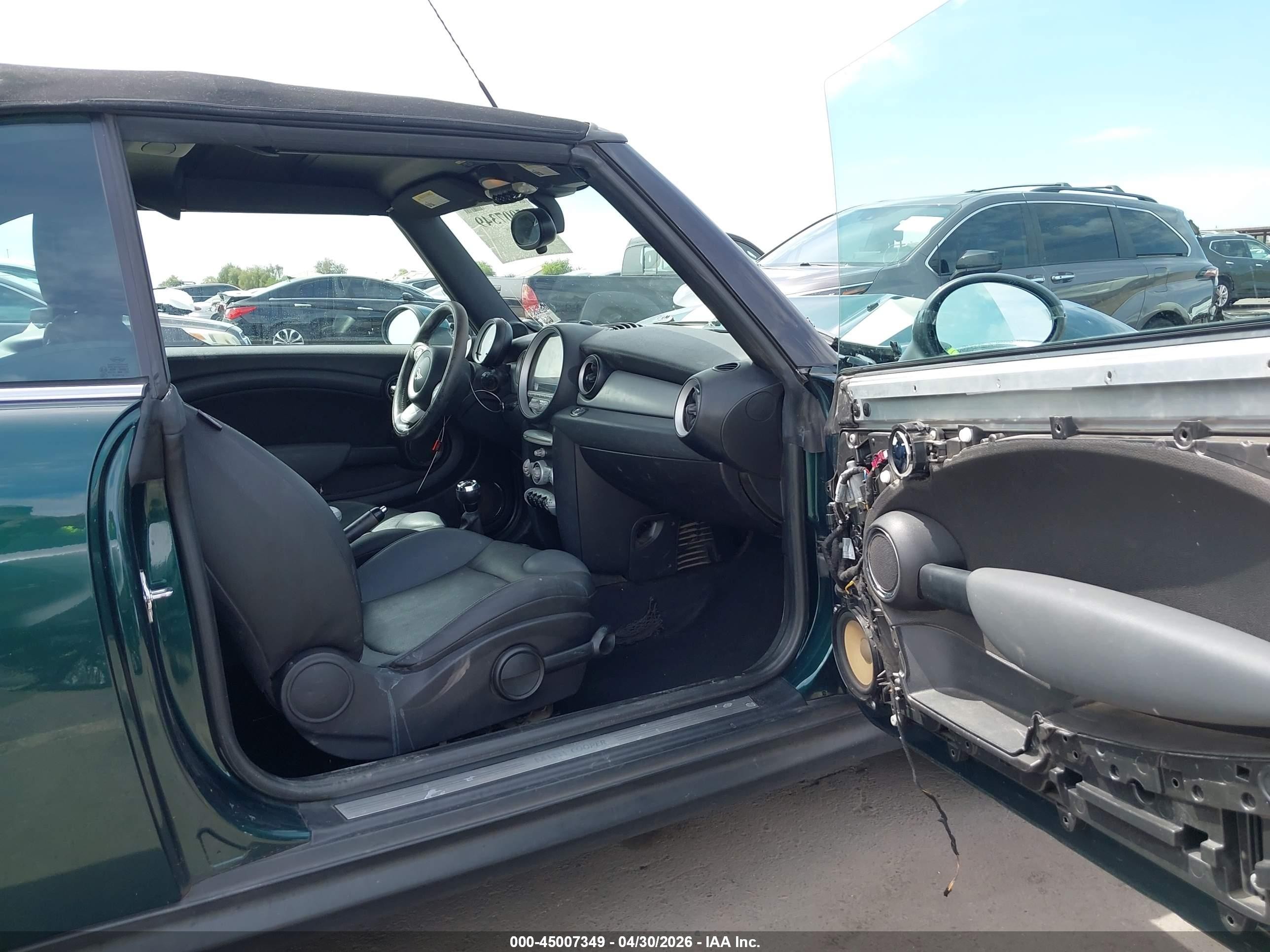 2009 Mini Cooper   Green vin: WMWMR33569TJ93909