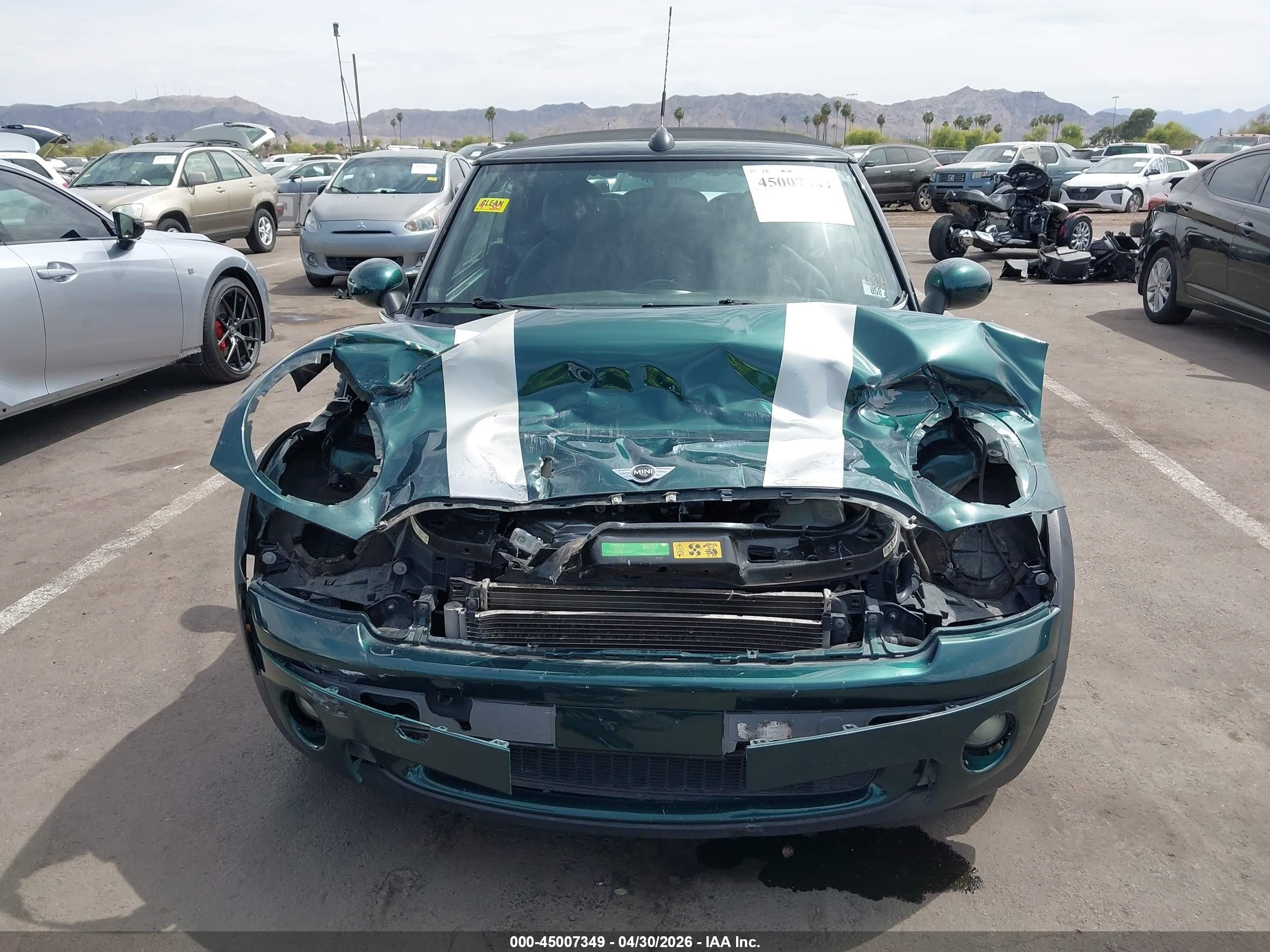 2009 Mini Cooper   Green vin: WMWMR33569TJ93909