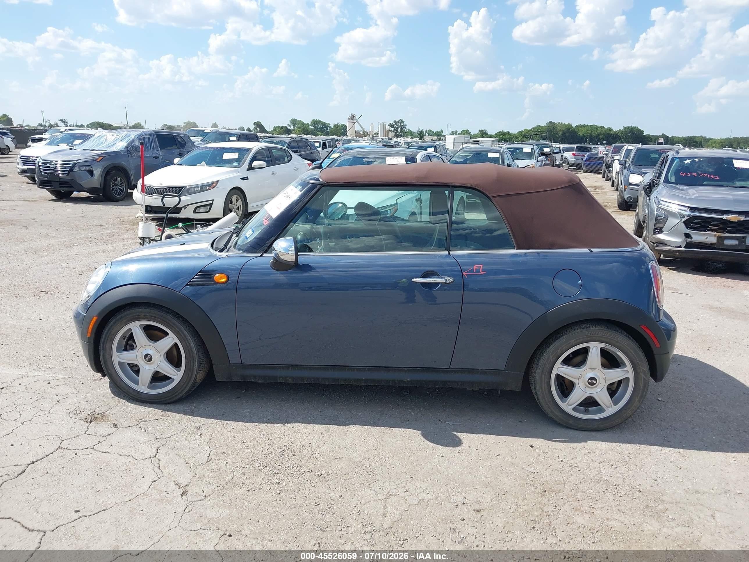 2009 Mini Cooper   Синий vin: WMWMR33579TU95046