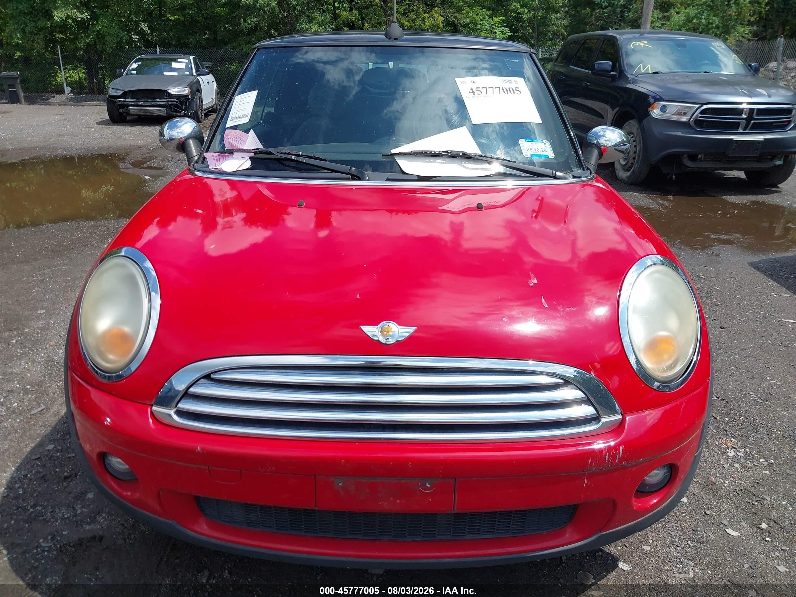2009 Mini Cooper   Red vin: WMWMR33589TJ93958