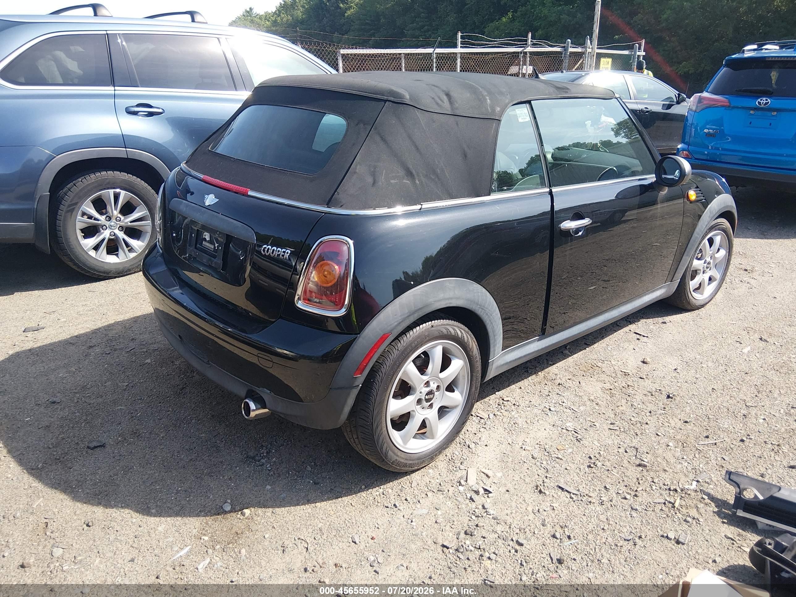 2010 Mini Cooper   Black vin: WMWMR3C57ATU97075