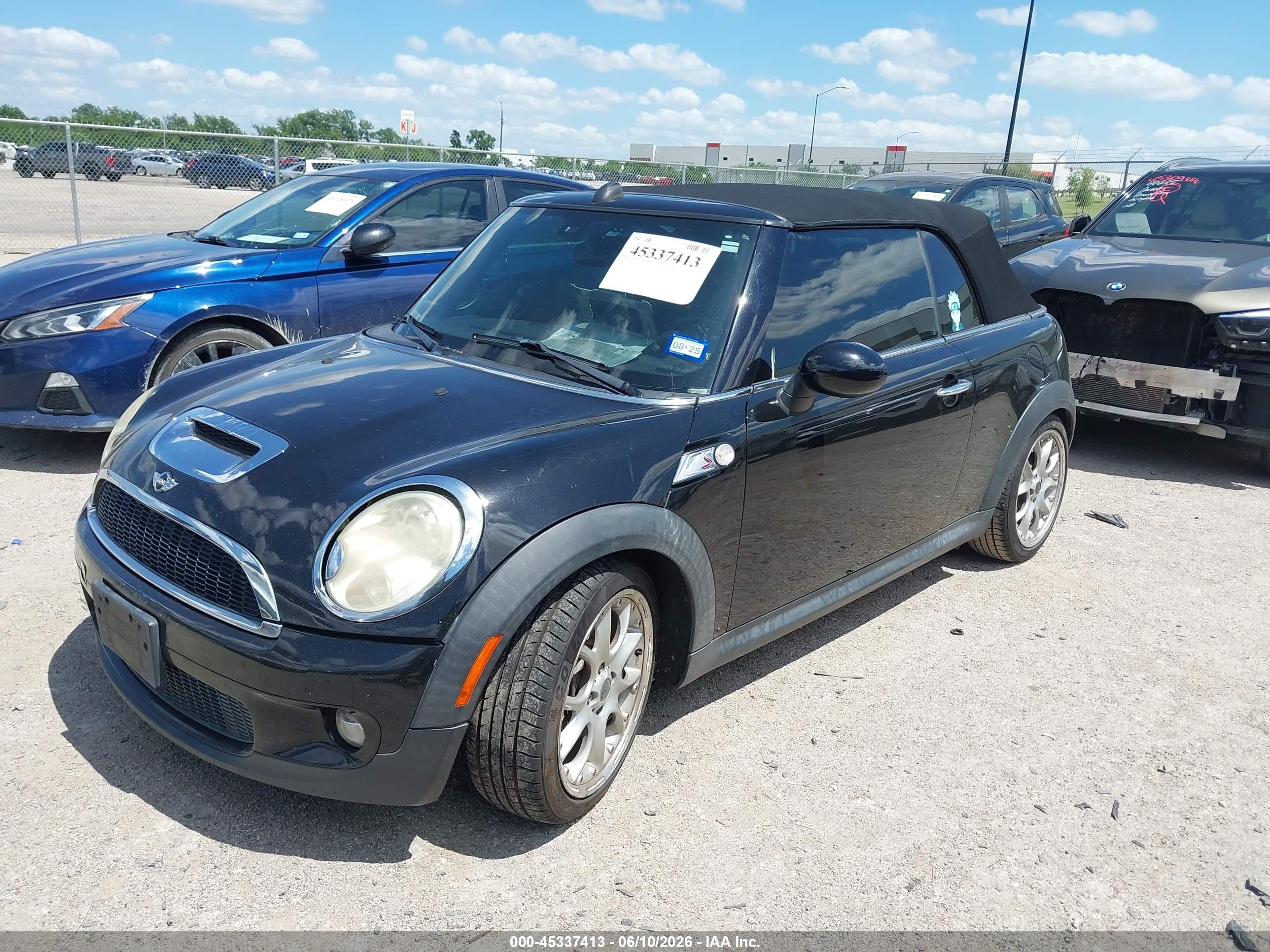 2009 Mini Cooper S   Black vin: WMWMS335X9TY07543