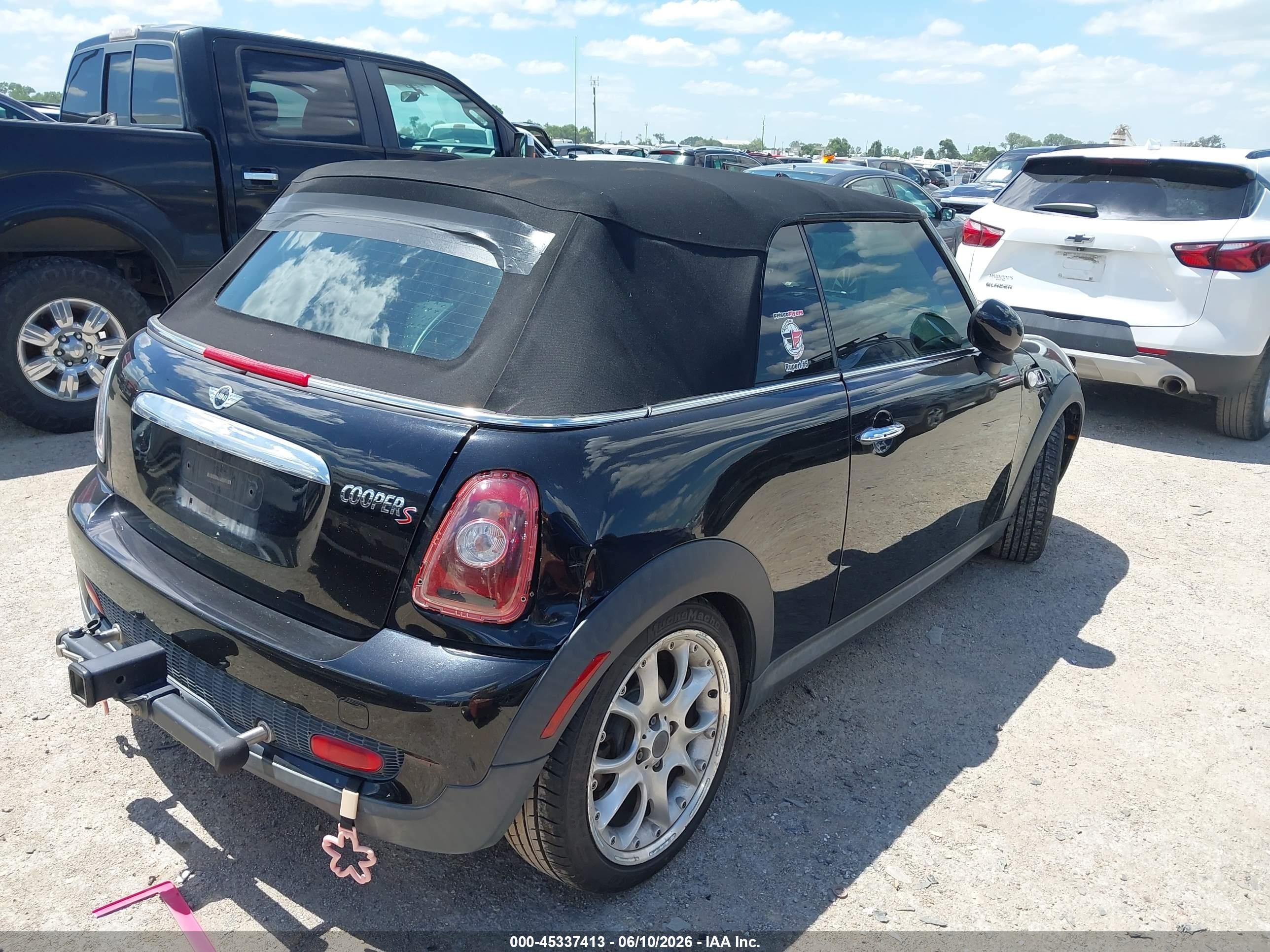 2009 Mini Cooper S   Black vin: WMWMS335X9TY07543