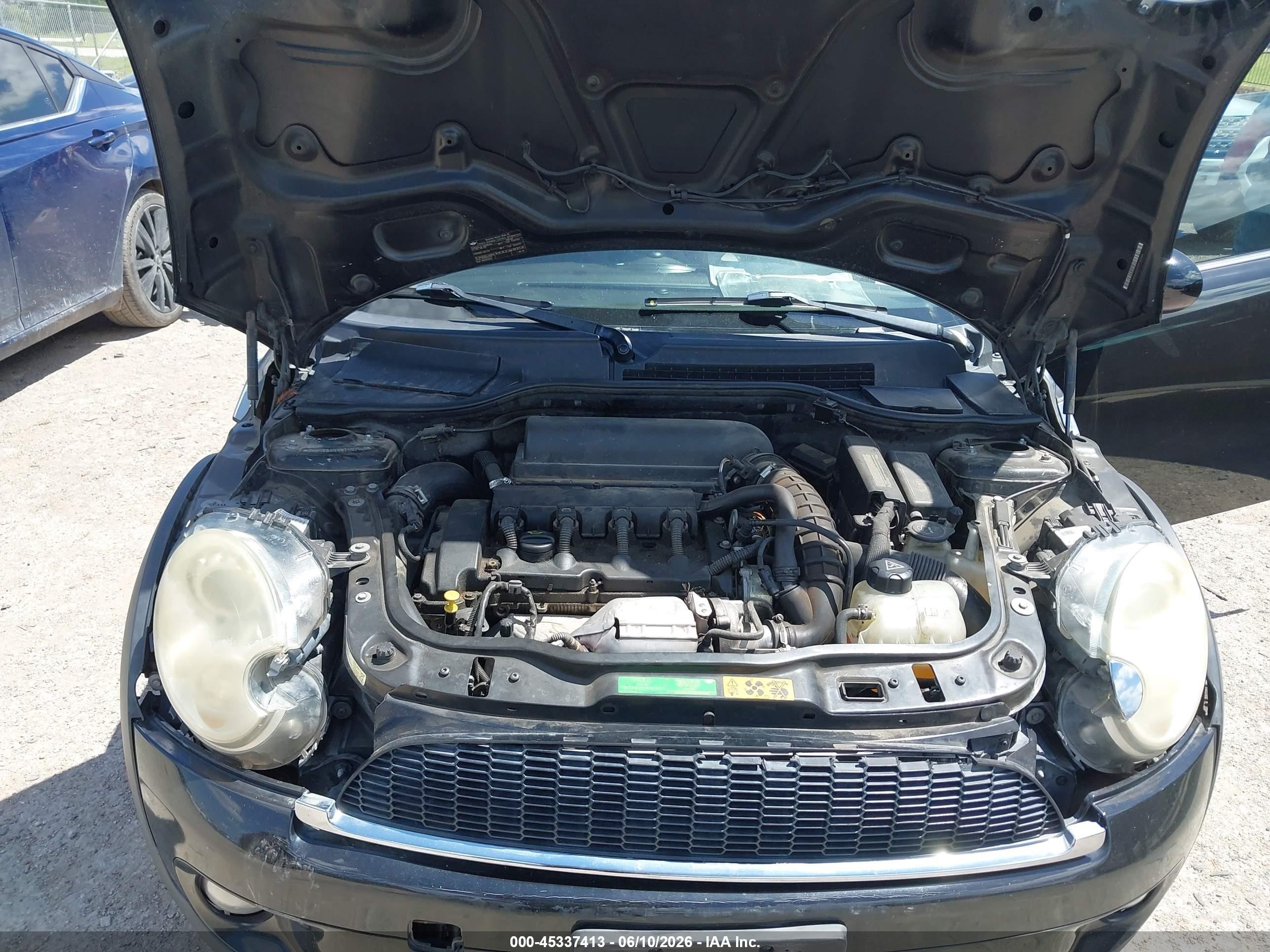 2009 Mini Cooper S   Black vin: WMWMS335X9TY07543