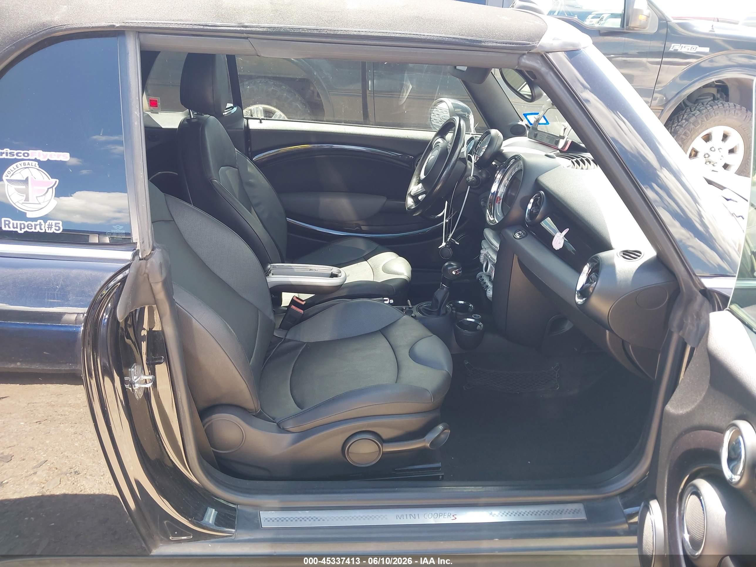 2009 Mini Cooper S   Black vin: WMWMS335X9TY07543