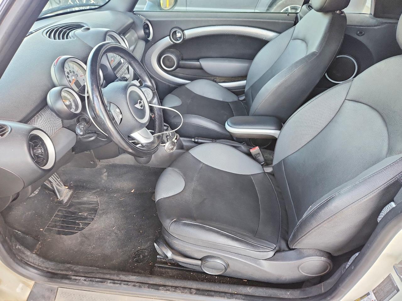 2010 Mini Cooper S Cream vin: WMWMS3C50ATZ84848