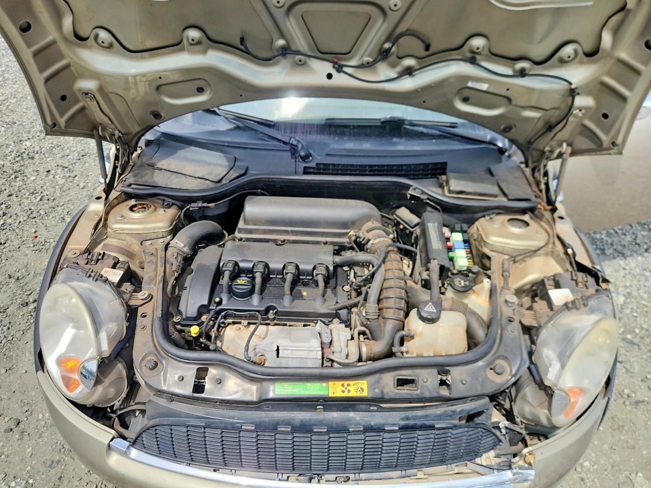 2010 Mini Cooper S Gold vin: WMWMS3C52ATY09307