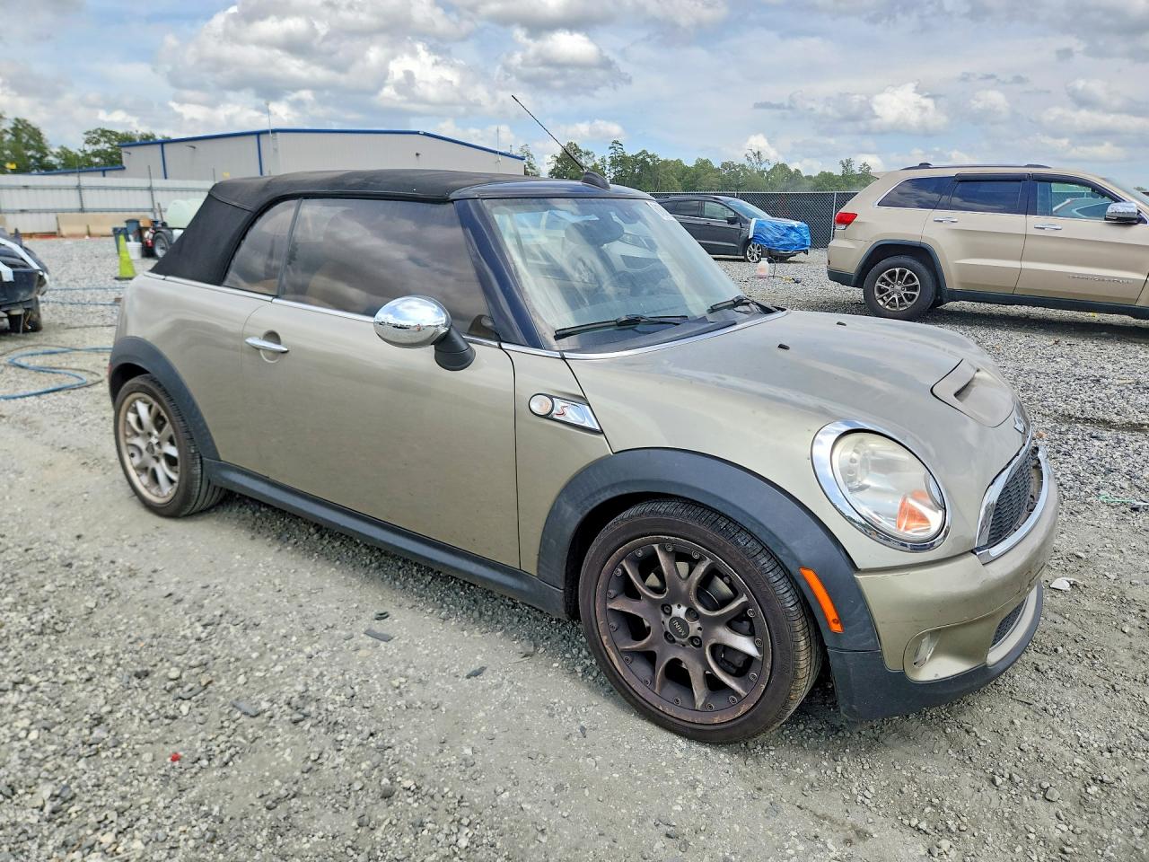 2010 Mini Cooper S Gold vin: WMWMS3C52ATY09307