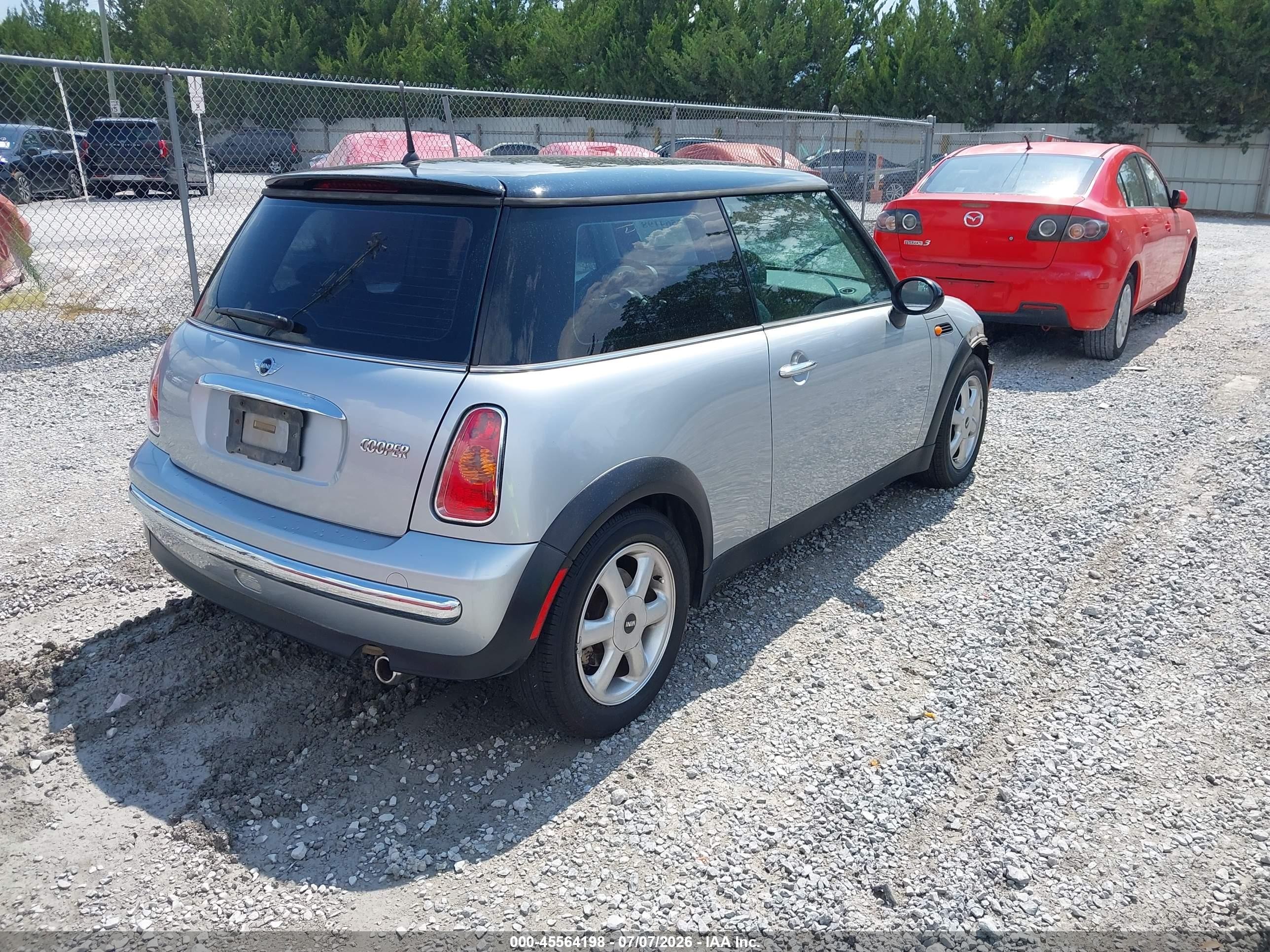 2004 Mini Cooper   Blue vin: WMWRC33404TC54519
