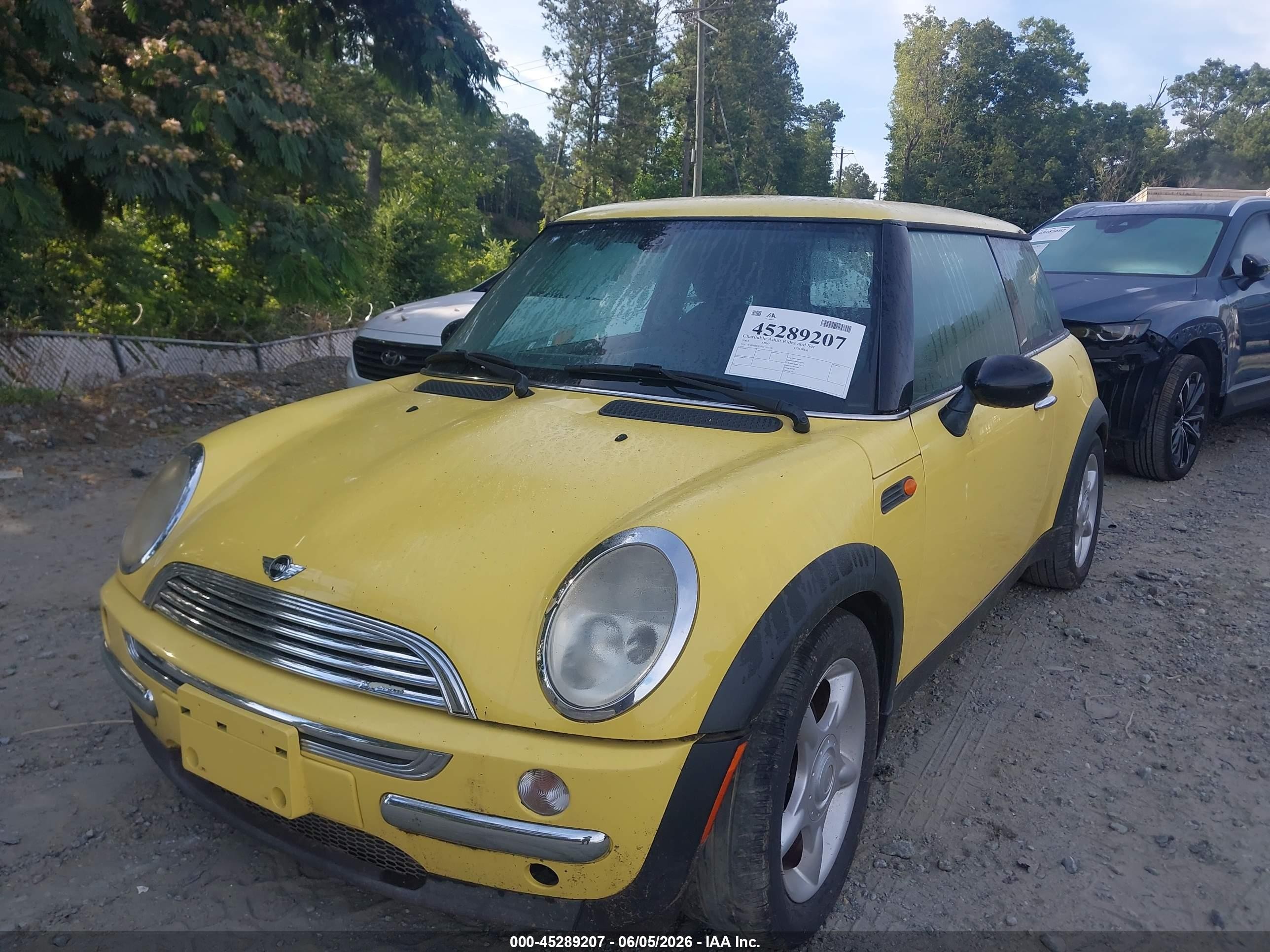 2004 Mini Cooper   Yellow vin: WMWRC33404TJ55132