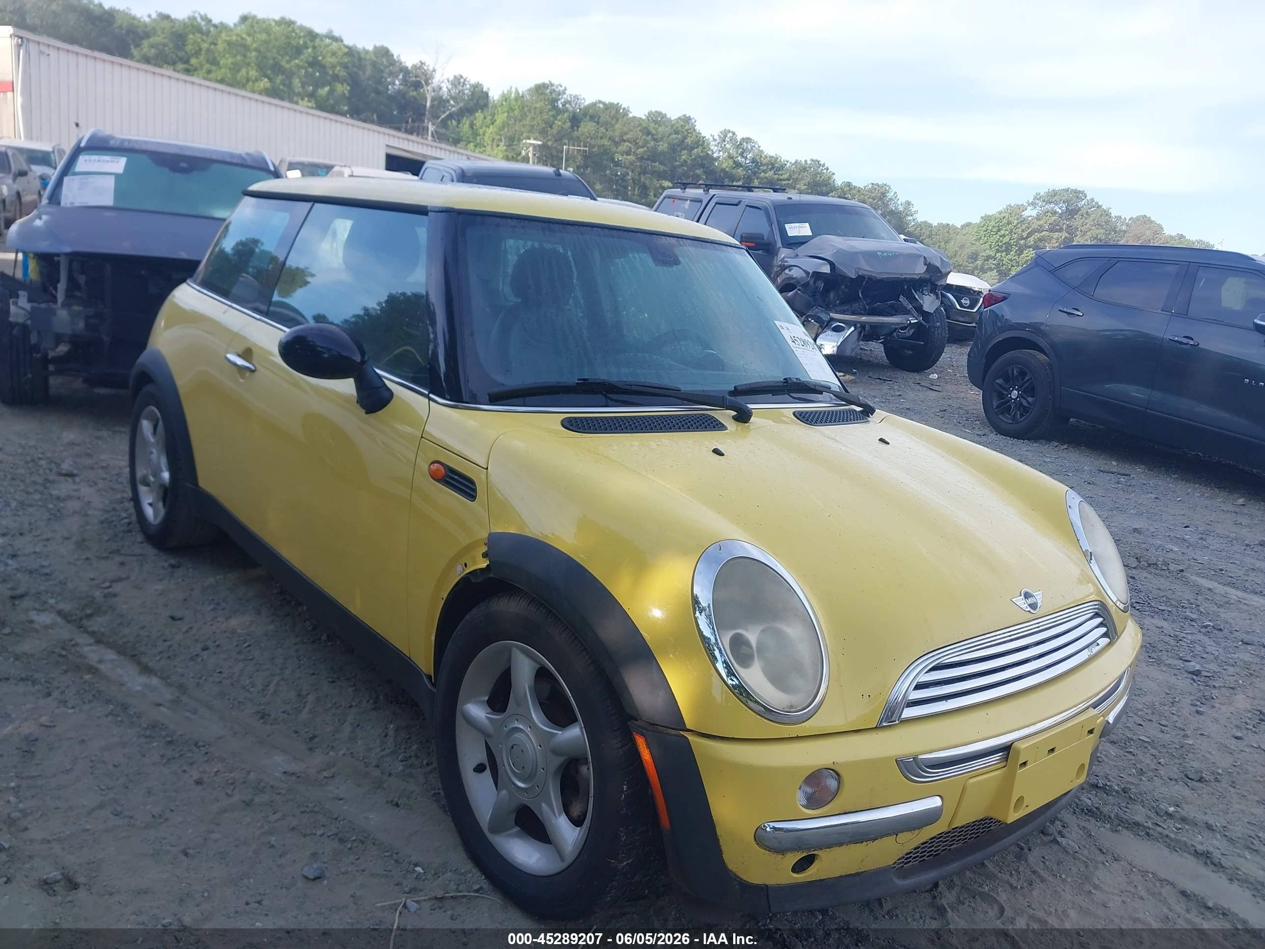 2004 Mini Cooper   Yellow vin: WMWRC33404TJ55132