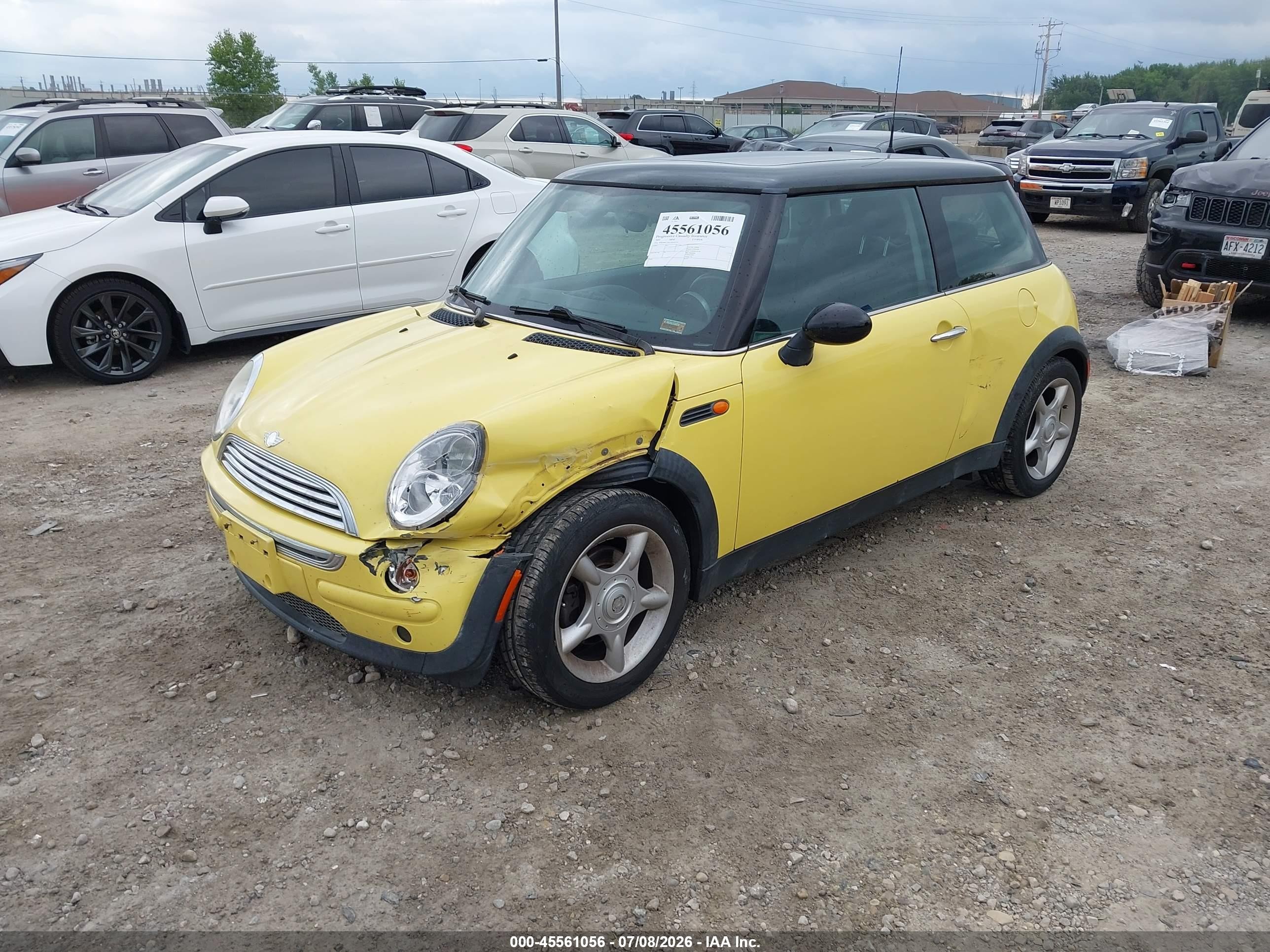 2003 Mini Cooper   Yellow vin: WMWRC33413TC45519