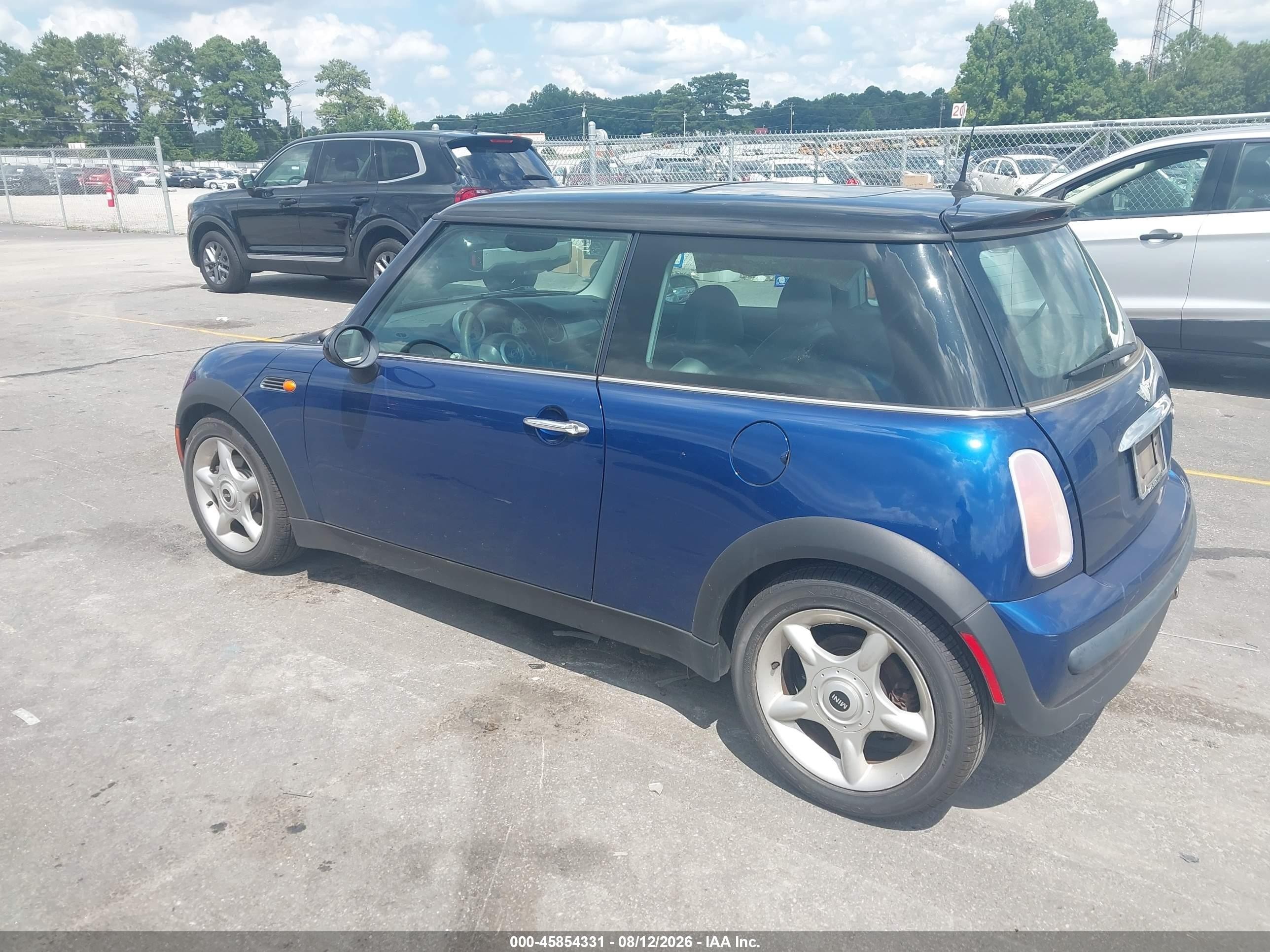 2004 Mini Cooper   Blue vin: WMWRC33414TC53850