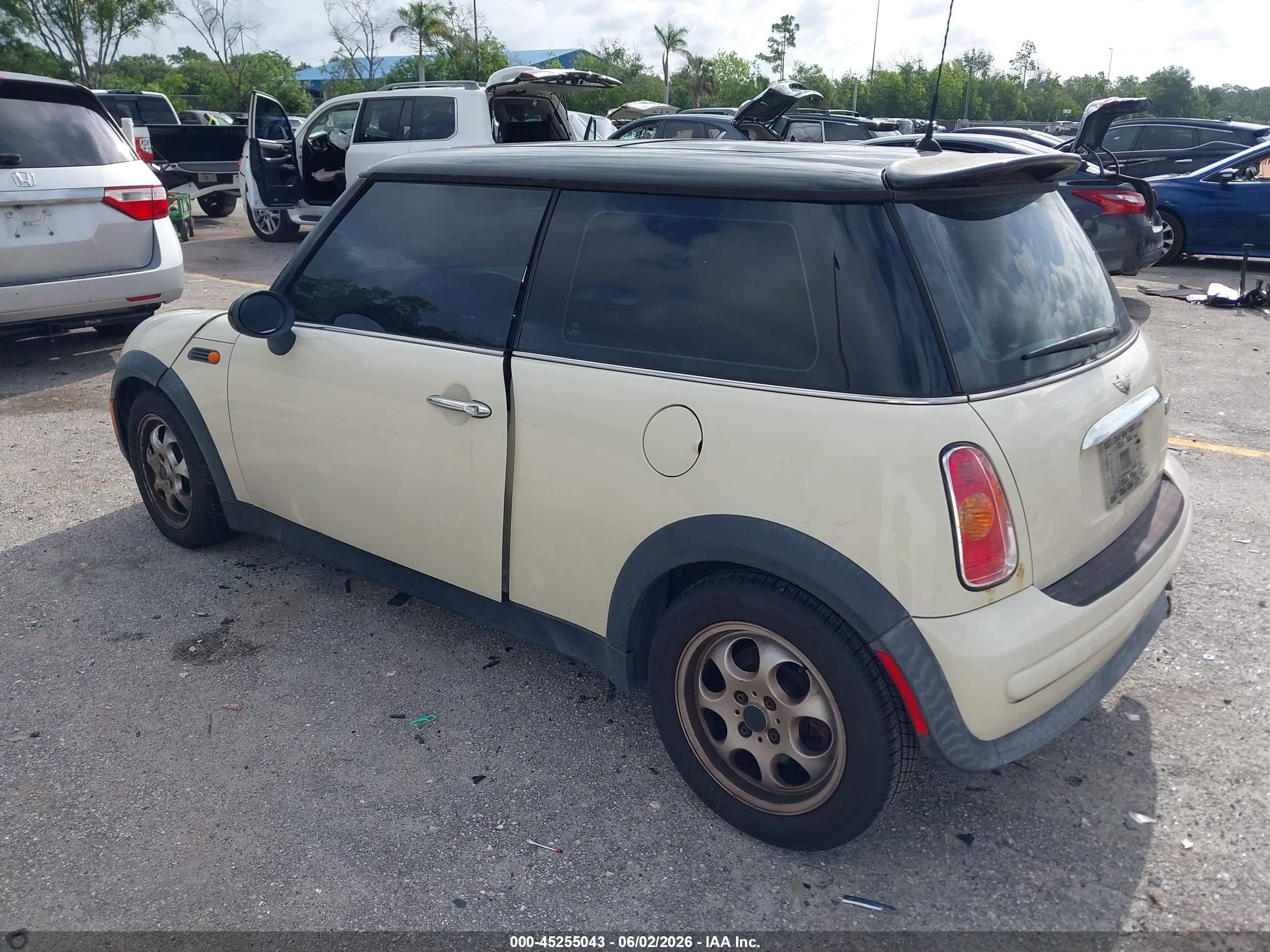 2003 Mini Cooper   Cream vin: WMWRC33423TE16701