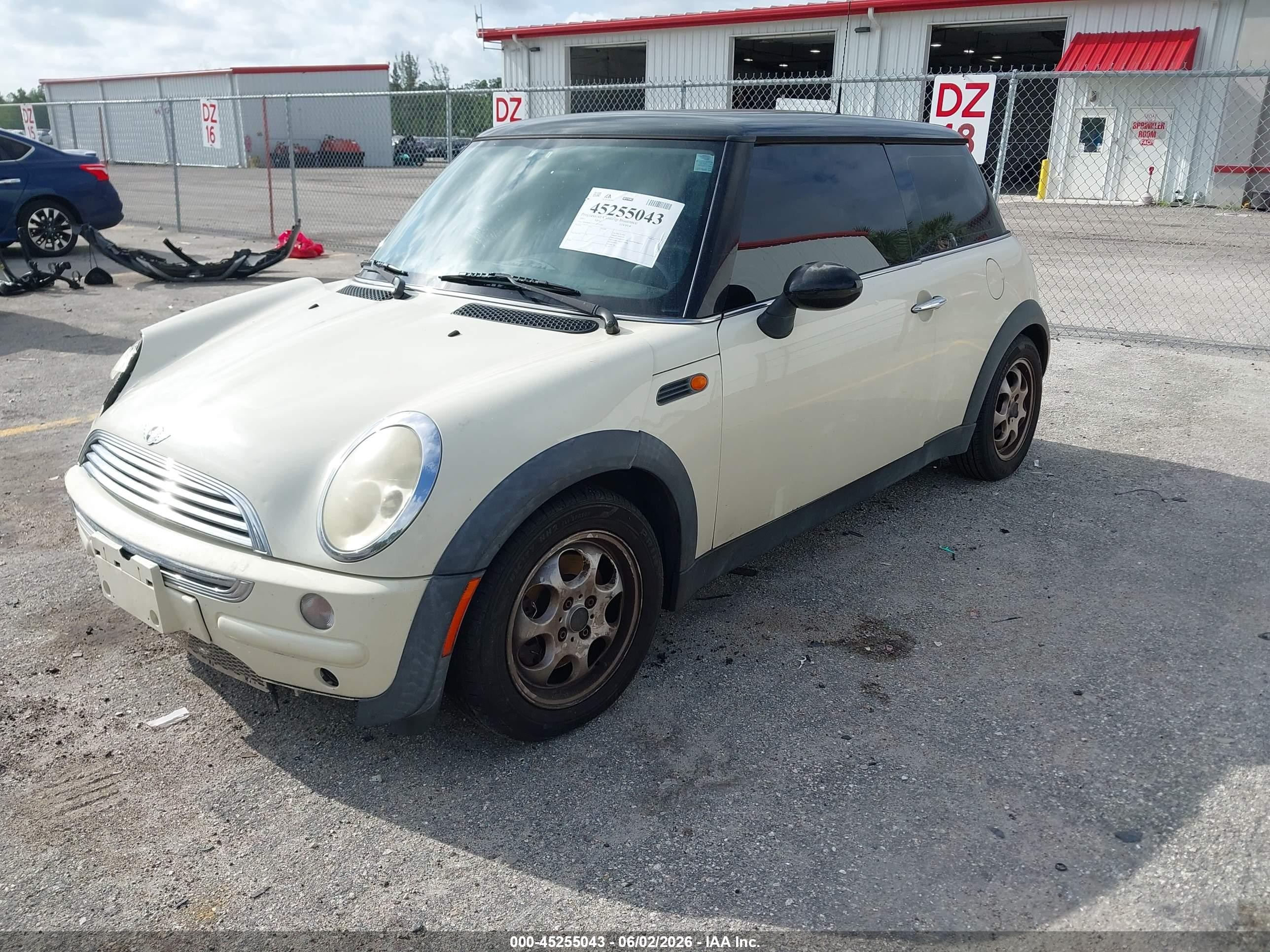 2003 Mini Cooper   Cream vin: WMWRC33423TE16701