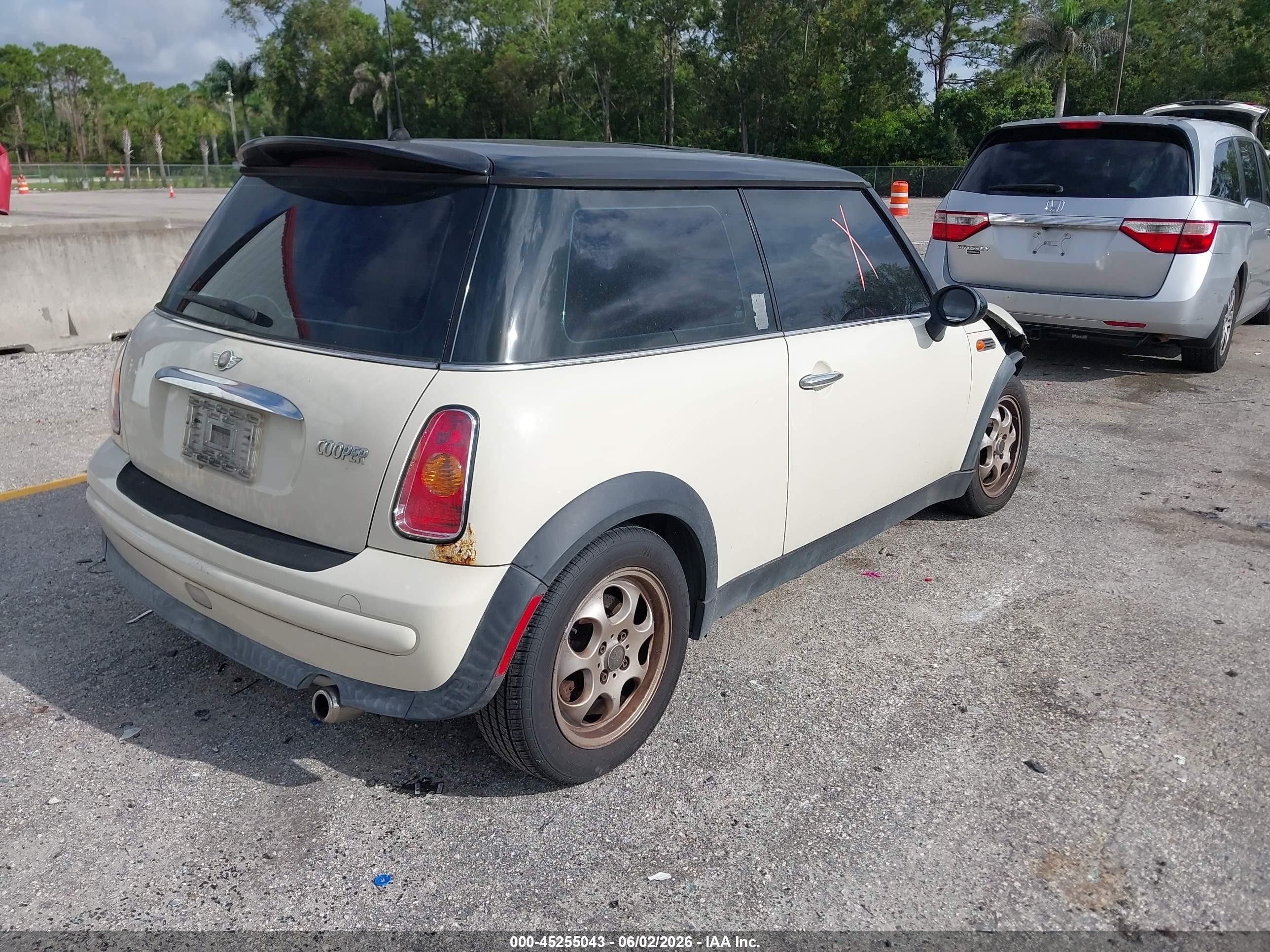 2003 Mini Cooper   Cream vin: WMWRC33423TE16701