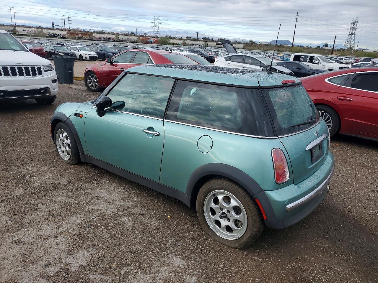 2003 Mini Cooper Turquoise vin: WMWRC33433TE13306