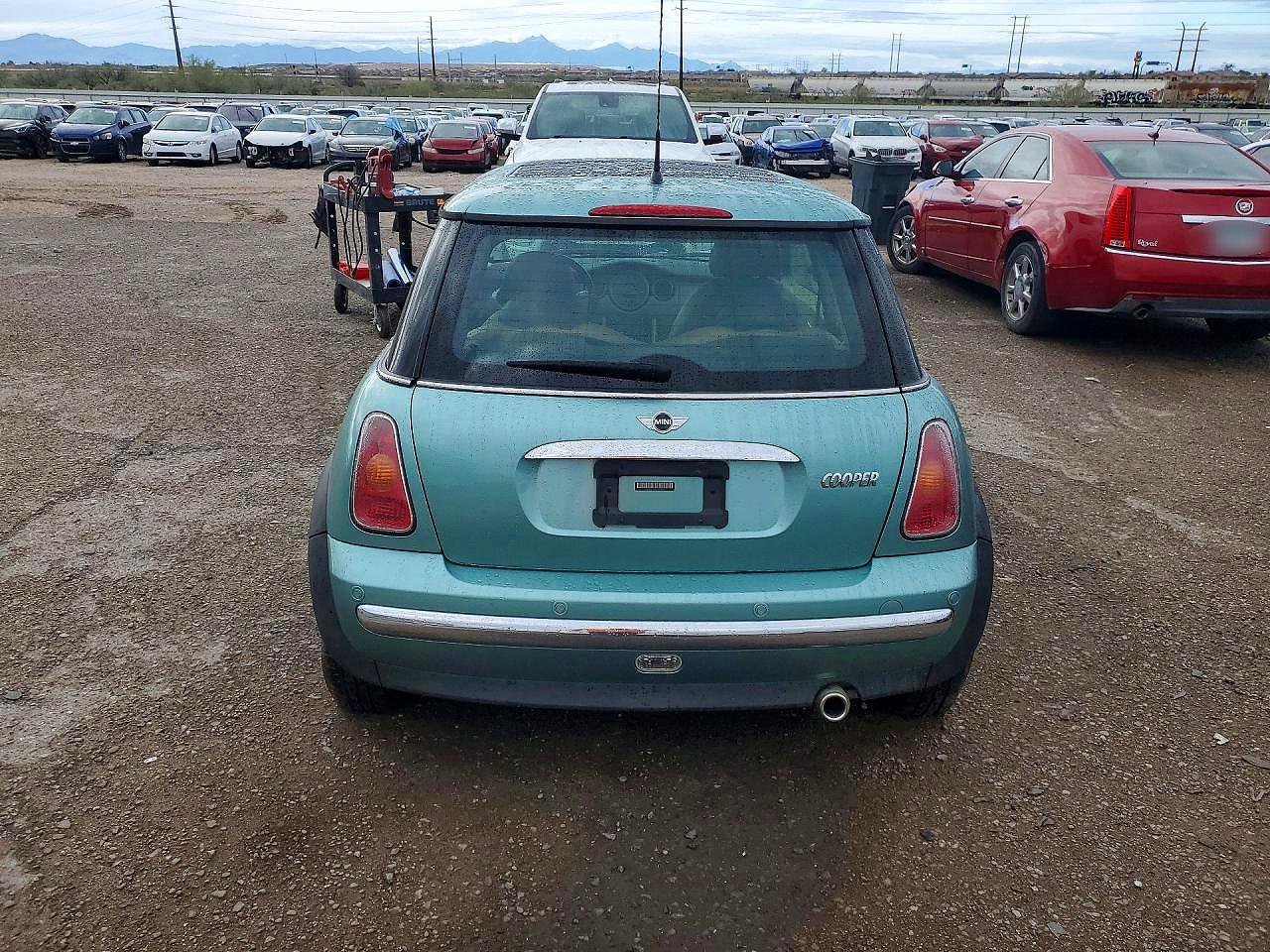 2003 Mini Cooper Turquoise vin: WMWRC33433TE13306