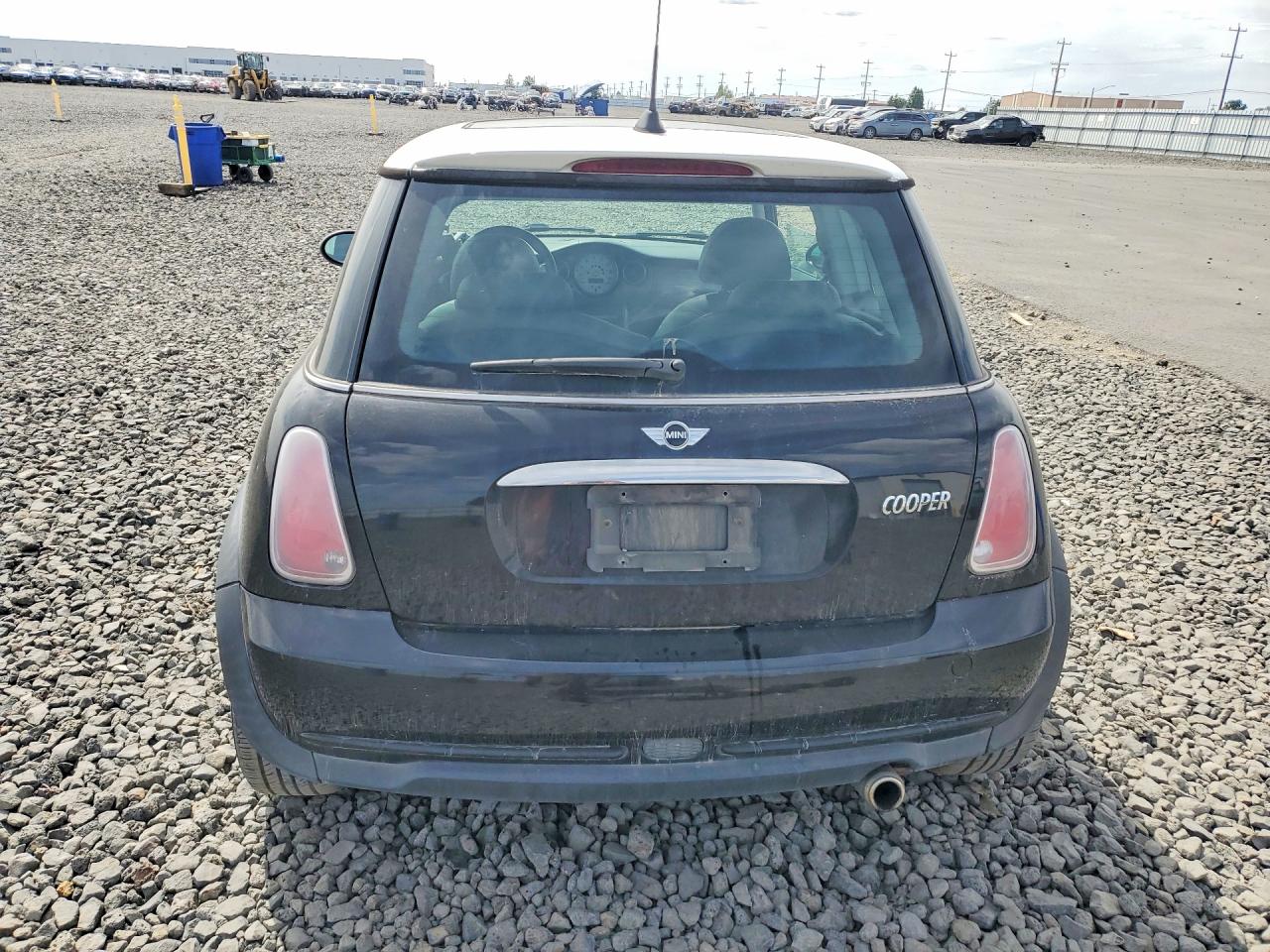 2005 Mini Cooper Black vin: WMWRC33435TJ66711