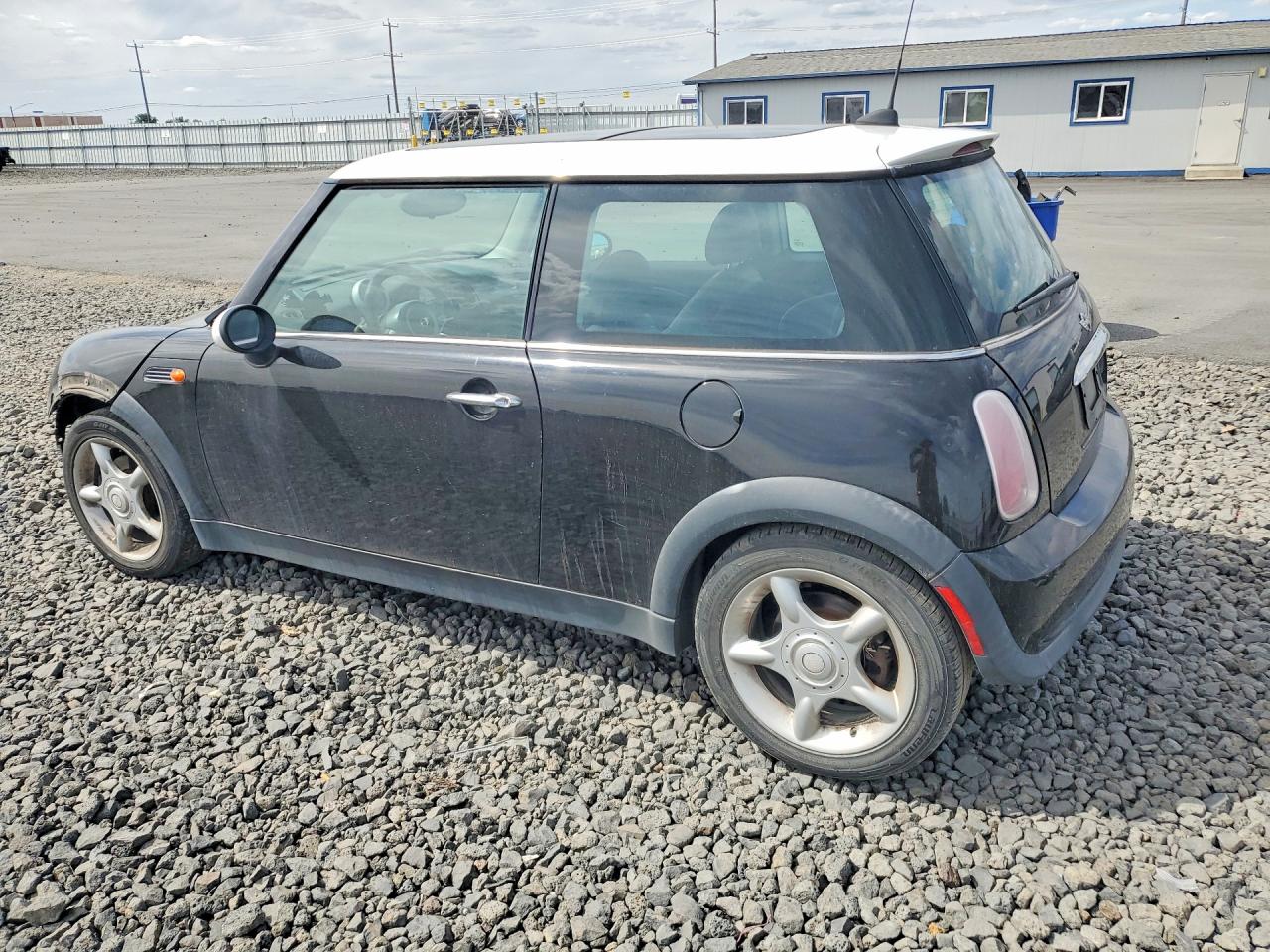 2005 Mini Cooper Black vin: WMWRC33435TJ66711
