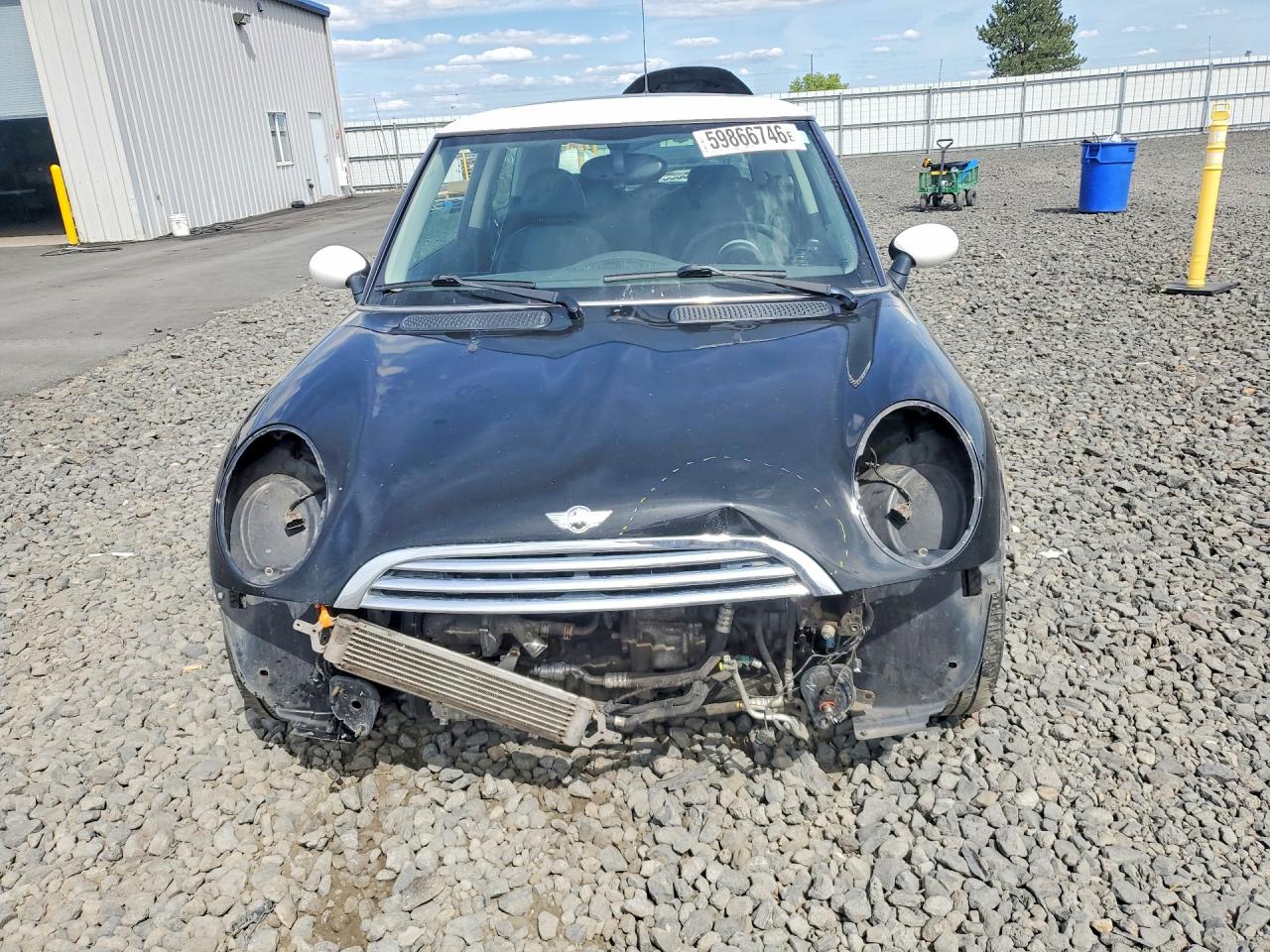 2005 Mini Cooper Black vin: WMWRC33435TJ66711