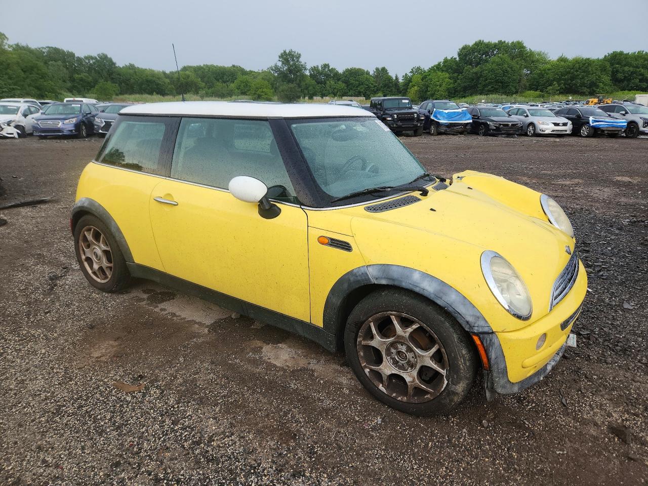 2002 Mini Cooper Yellow vin: WMWRC33442TC37896
