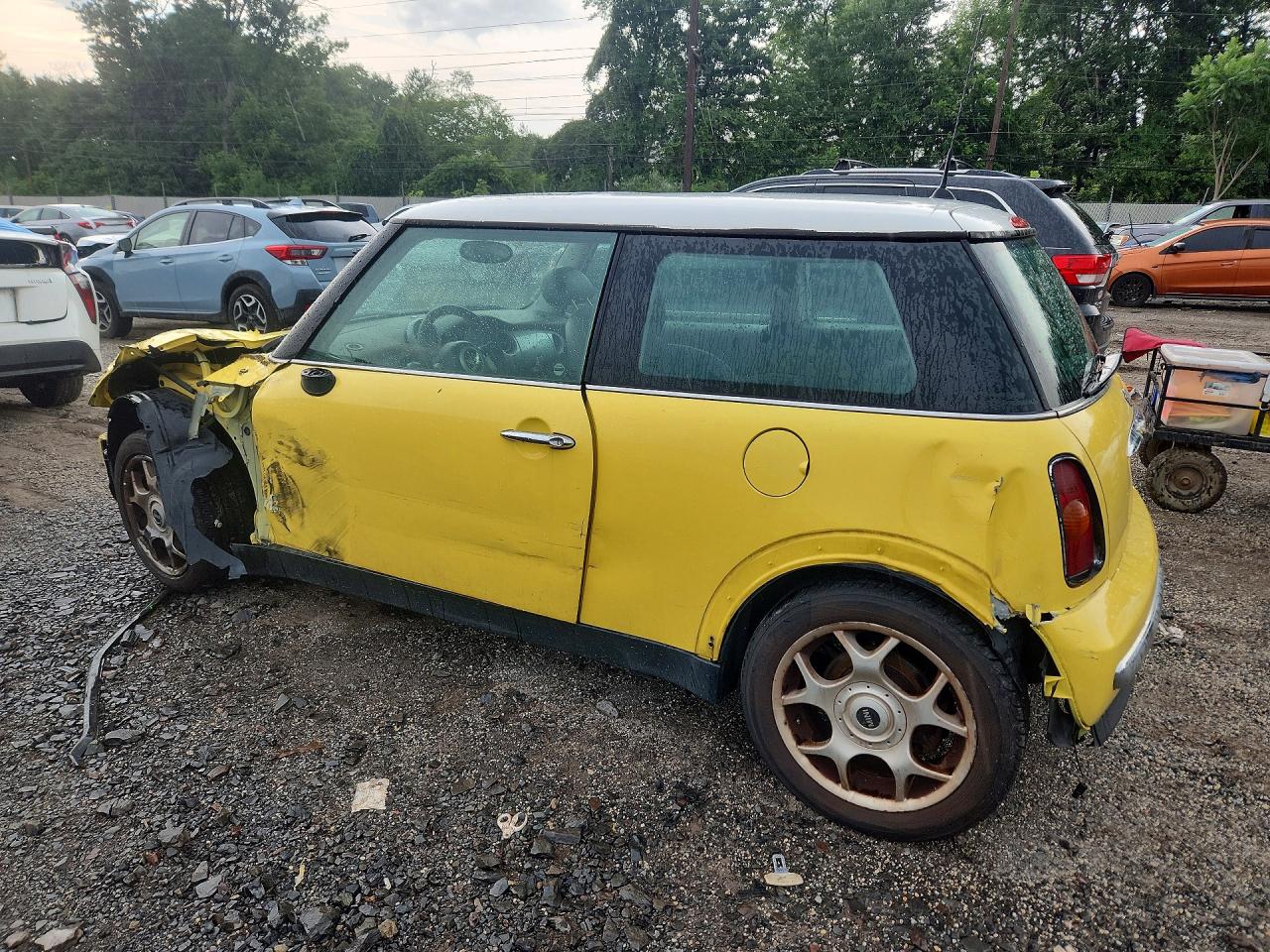2002 Mini Cooper Yellow vin: WMWRC33442TC37896
