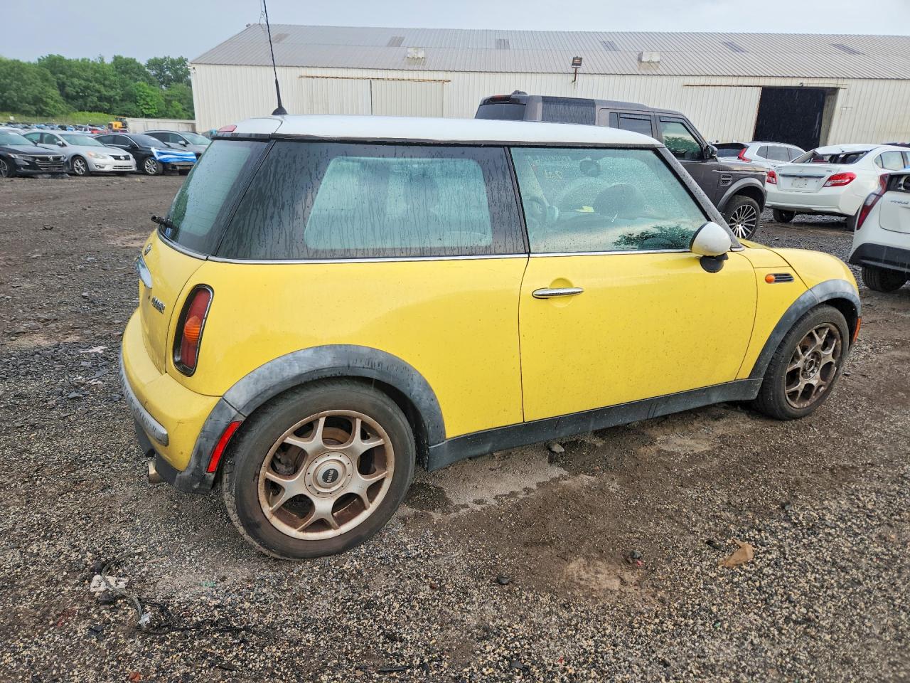 2002 Mini Cooper Yellow vin: WMWRC33442TC37896