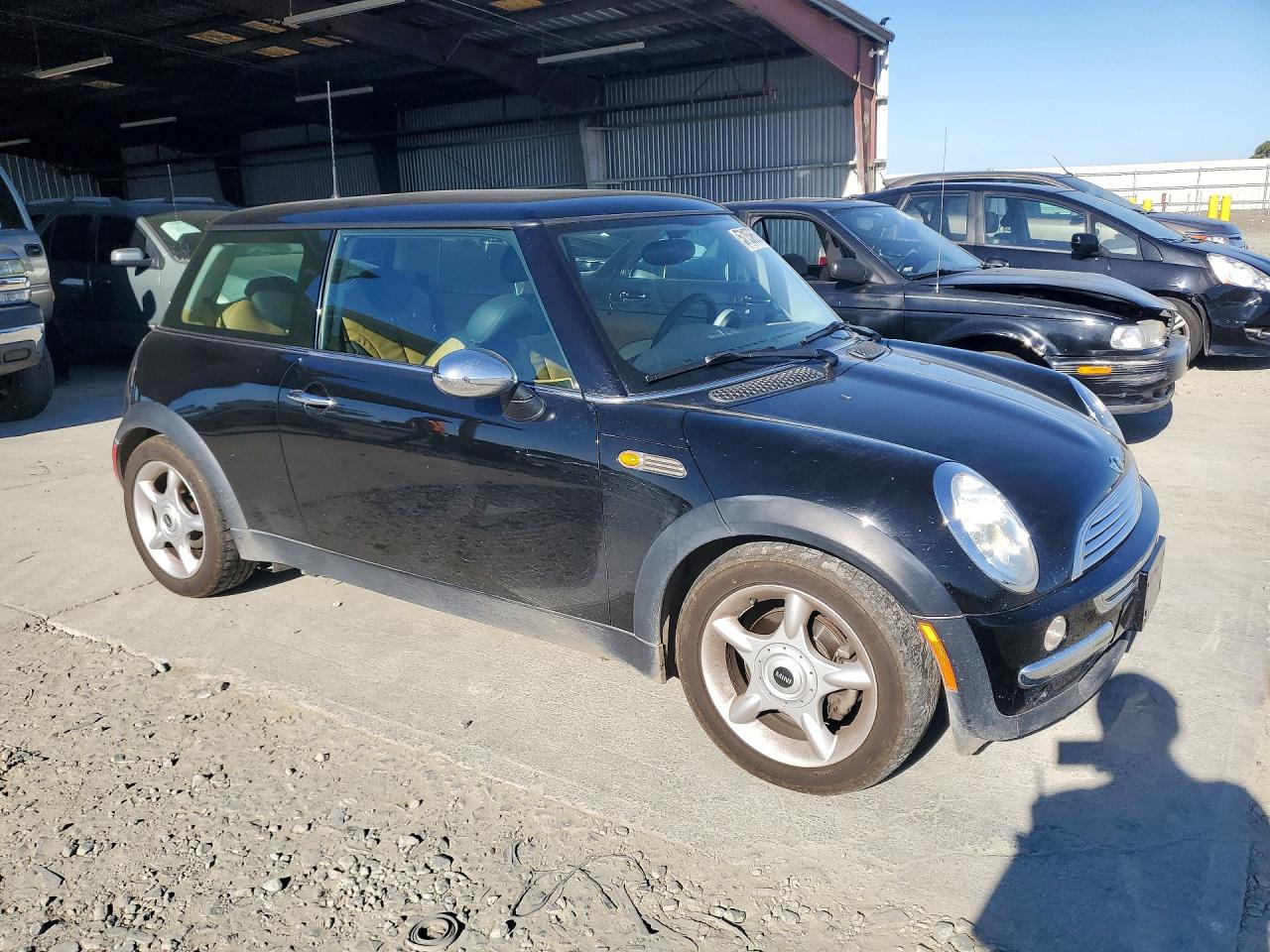 2003 Mini Cooper Base 2d Hatch Black vin: WMWRC33443TE15792