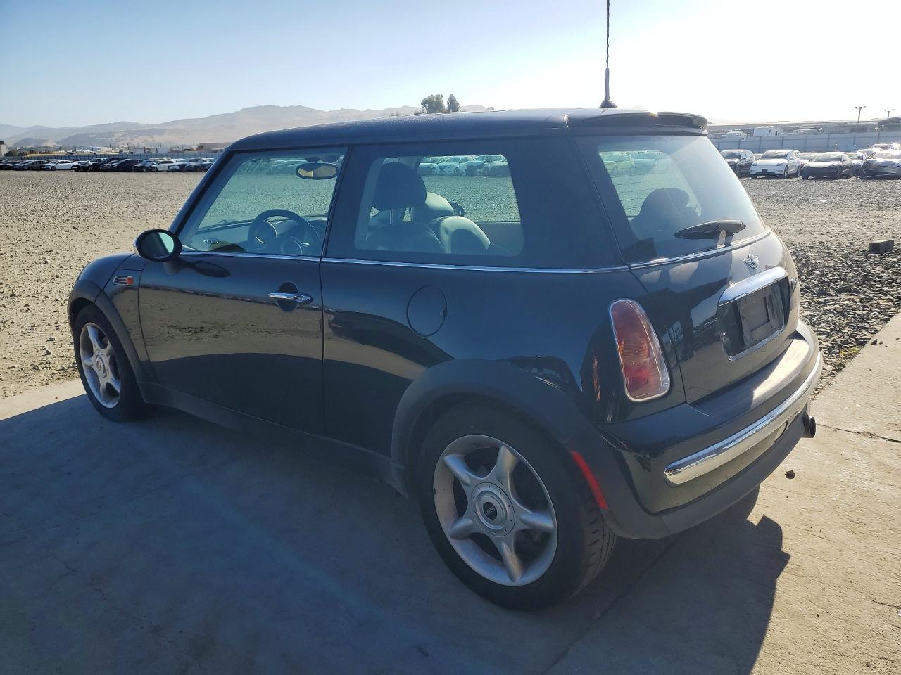 2003 Mini Cooper Base 2d Hatch Black vin: WMWRC33443TE15792