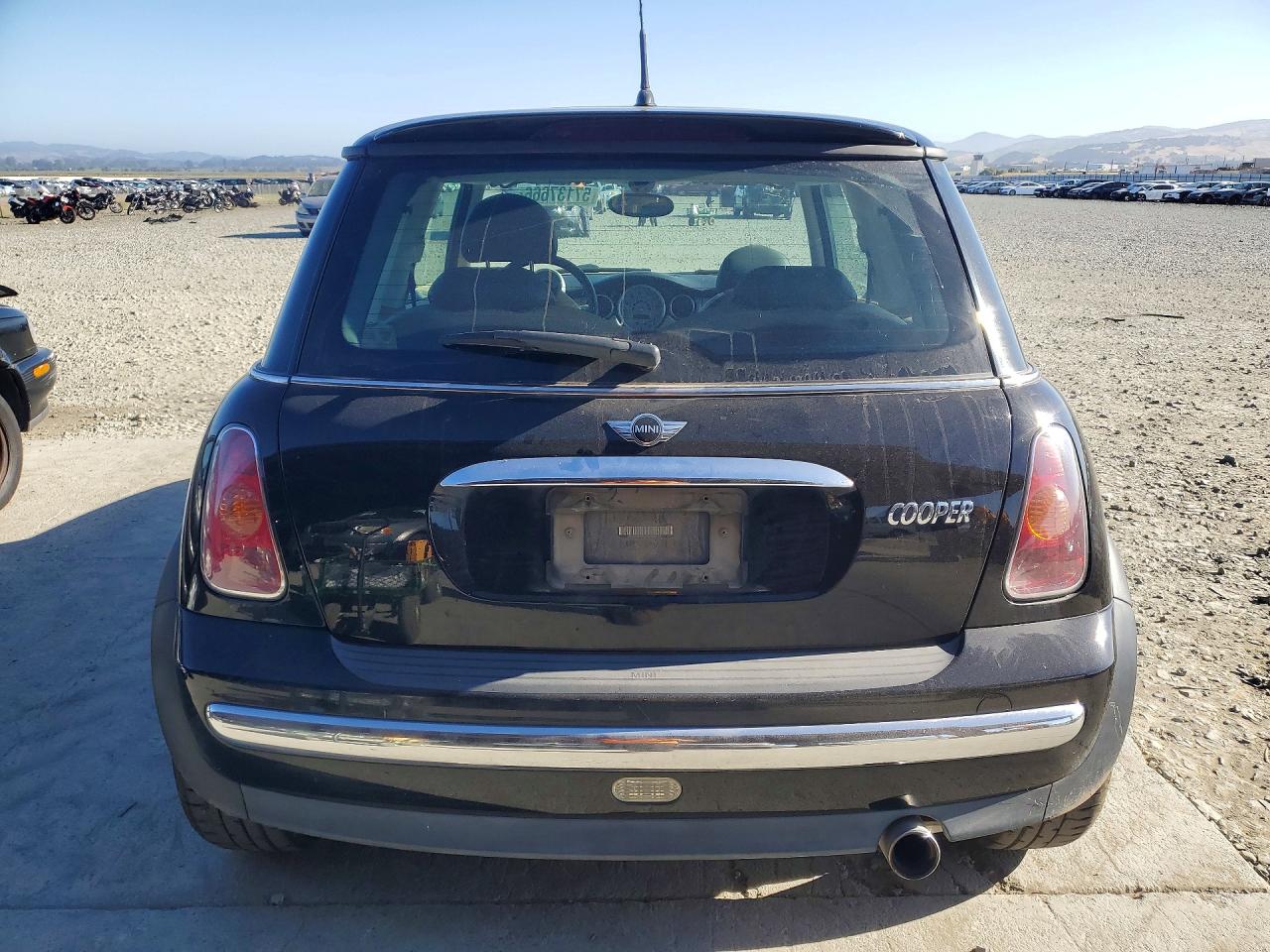 2003 Mini Cooper Base 2d Hatch Black vin: WMWRC33443TE15792