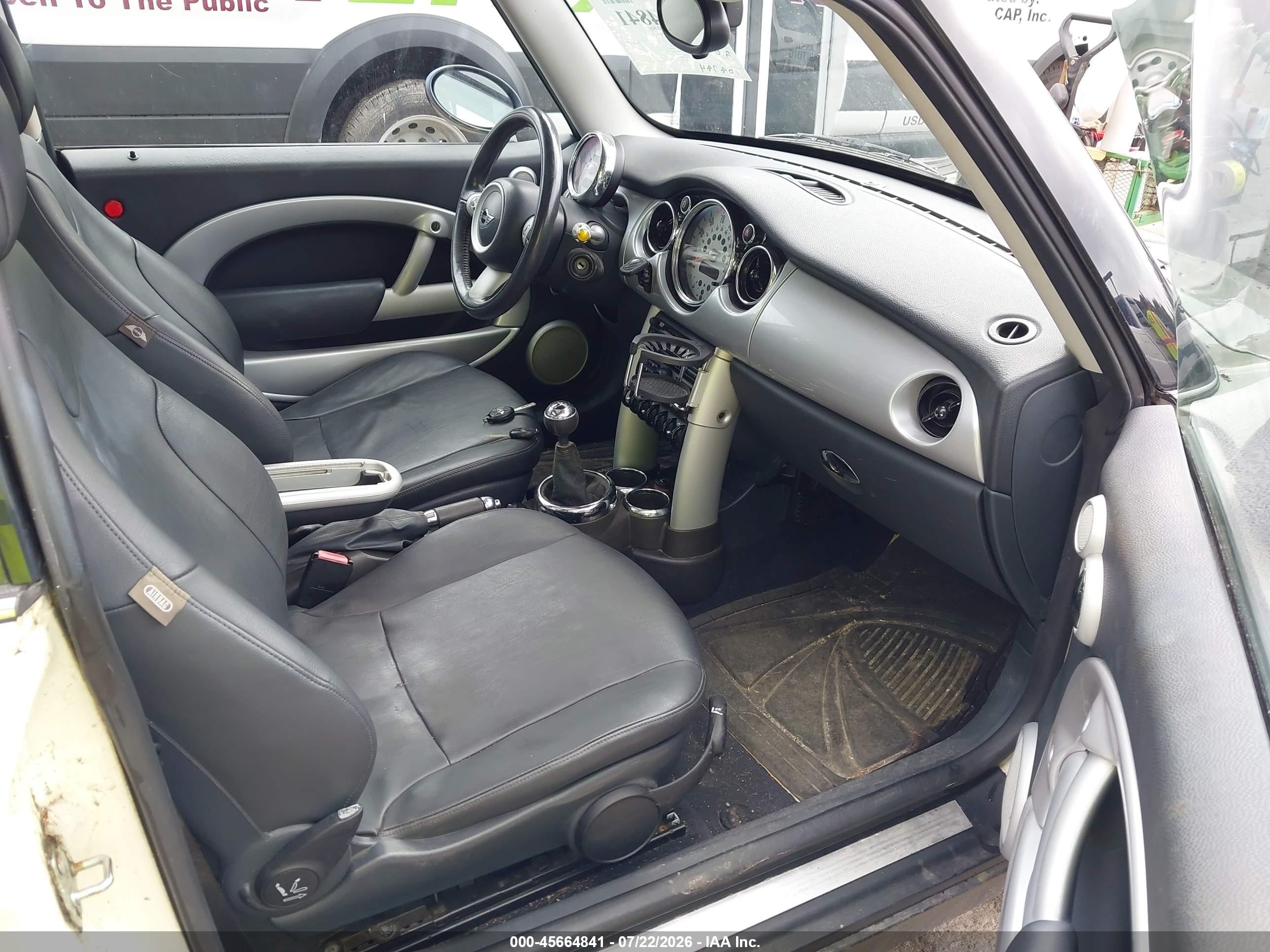 2005 Mini Cooper   Cream vin: WMWRC33455TC59491